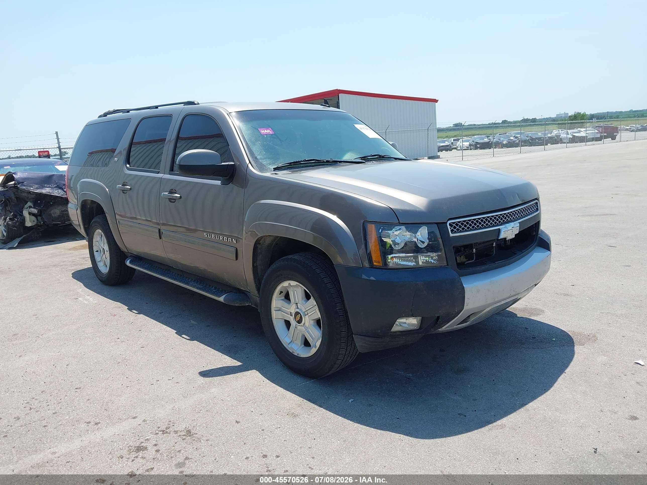 2011 Chevrolet Suburban LT, VIN 1GNSKJE32BR285737 — Hail