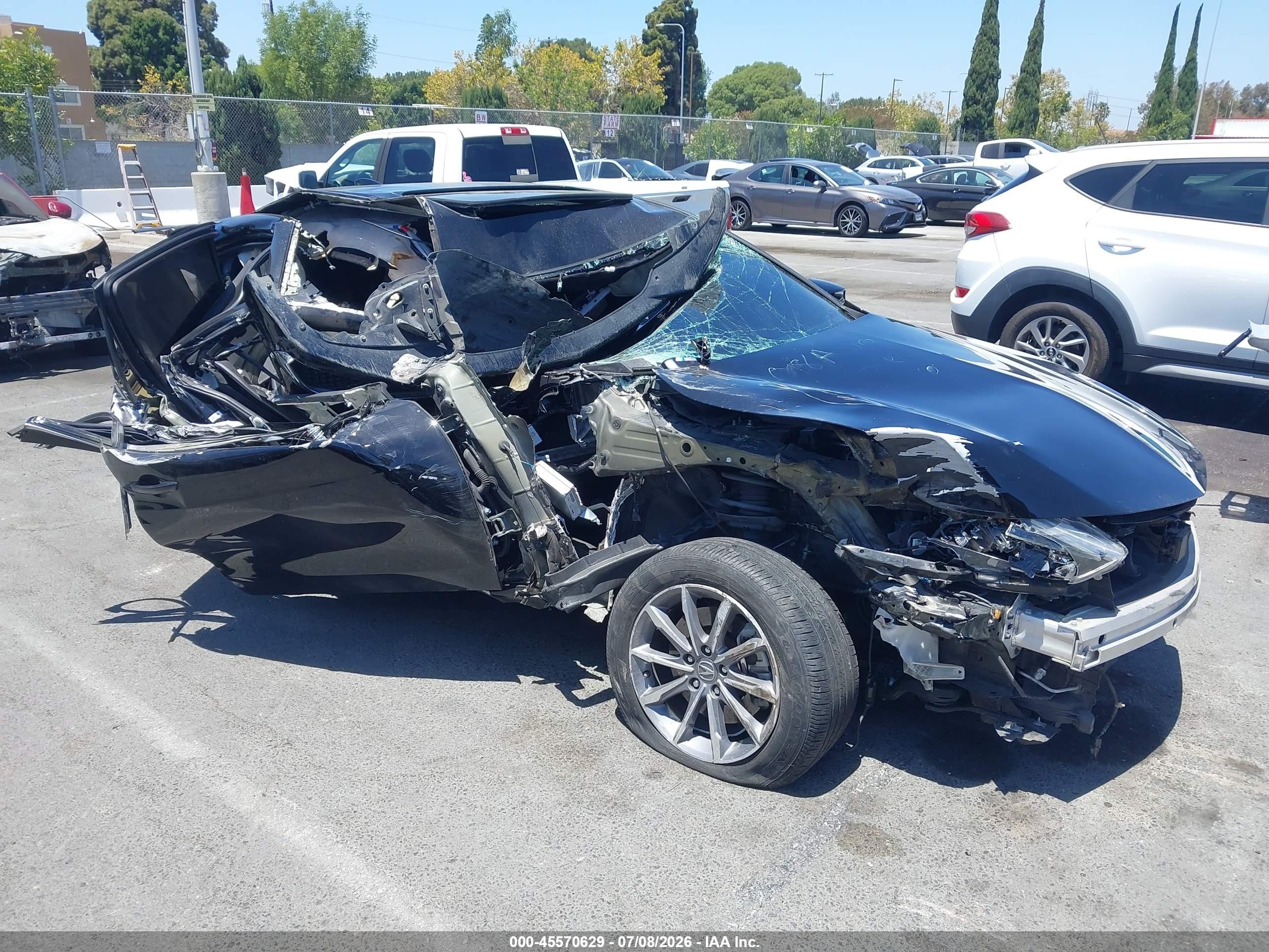 2018 Acura TLX, VIN 19UUB1F33JA006066 — Бок