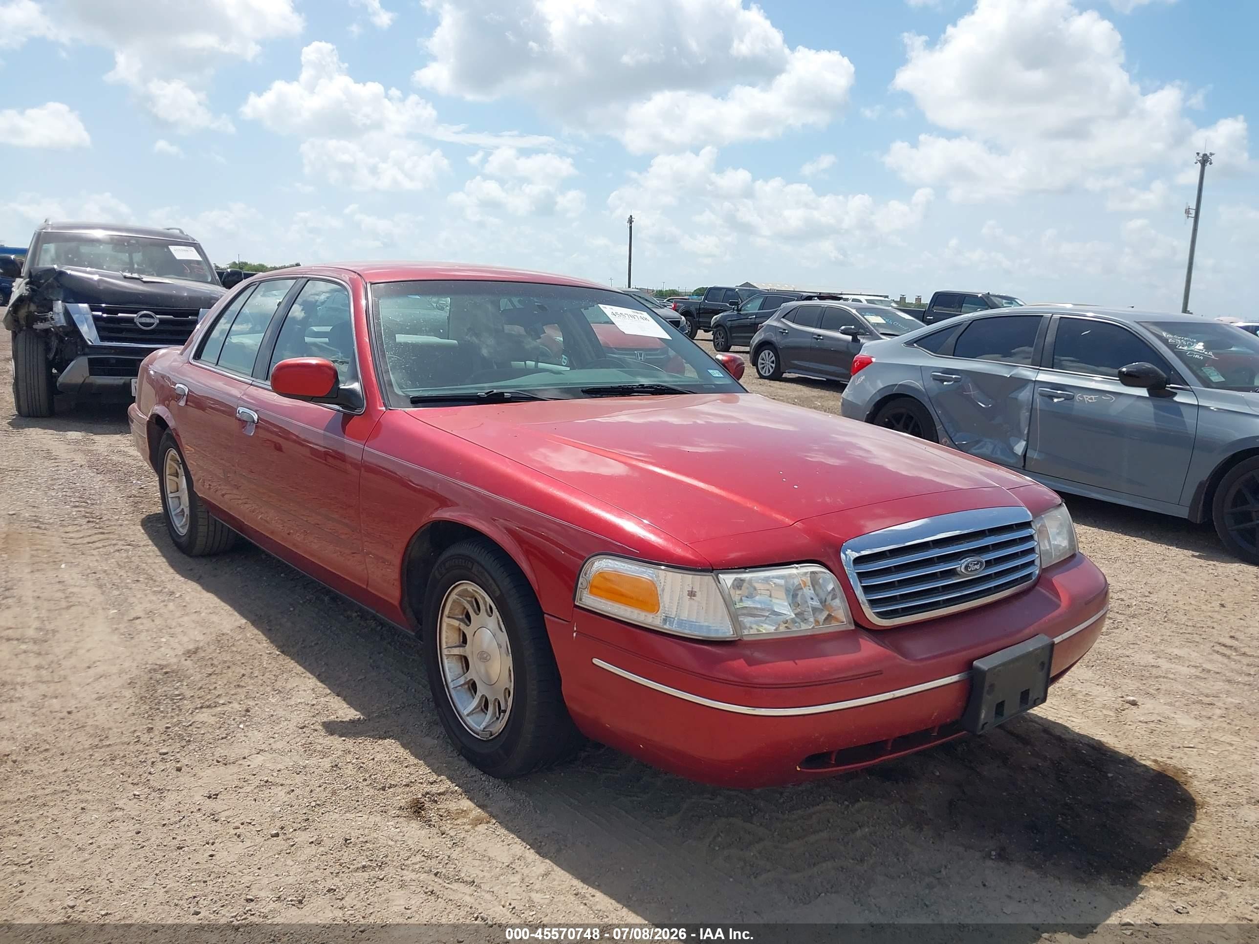 1999 Ford Crown Victoria LX, VIN 2FAFP74W4XX139658 — Normal wear