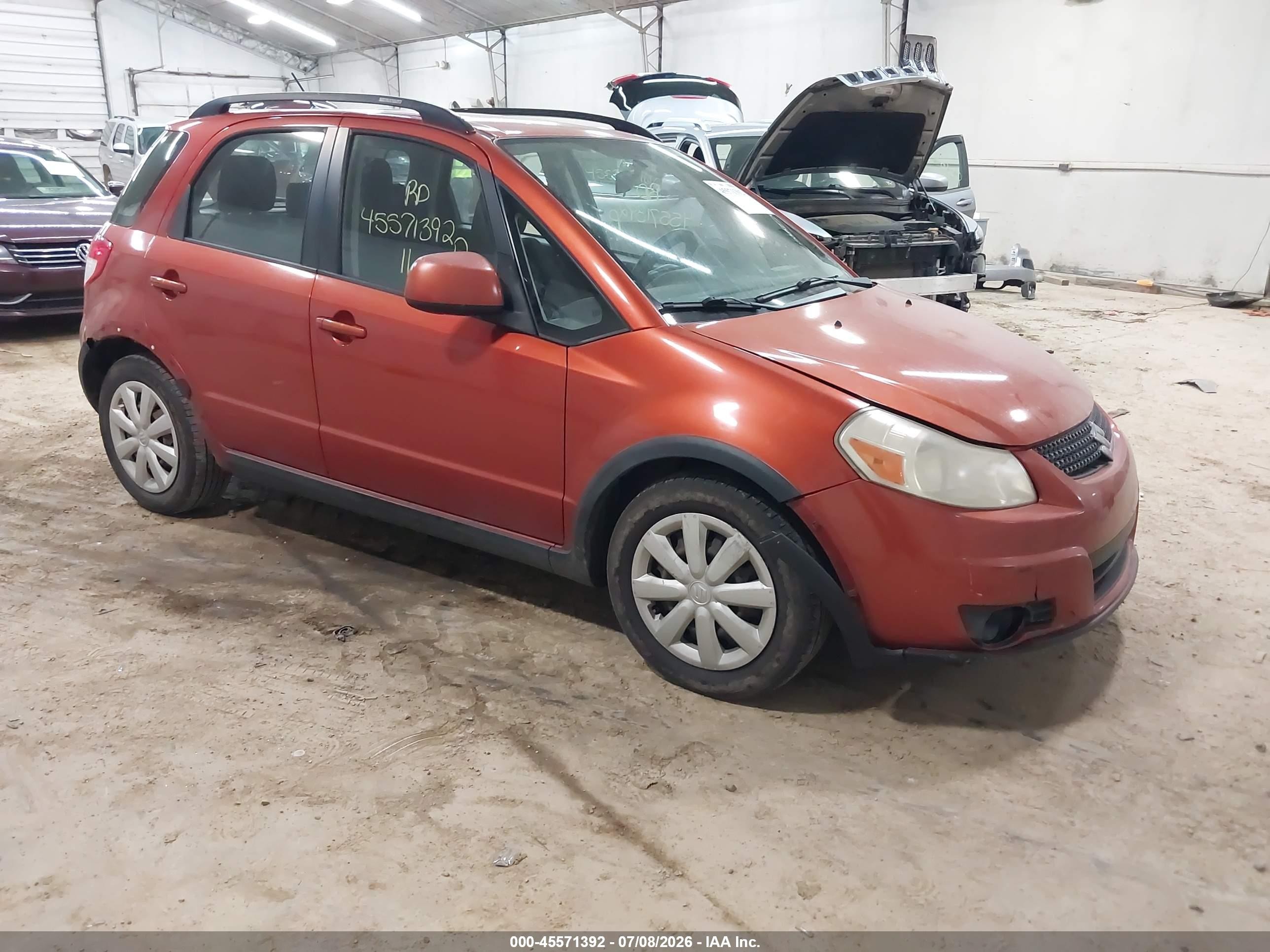 2011 Suzuki SX4 Crossover, VIN JS2YB5A30B6303921 — Side