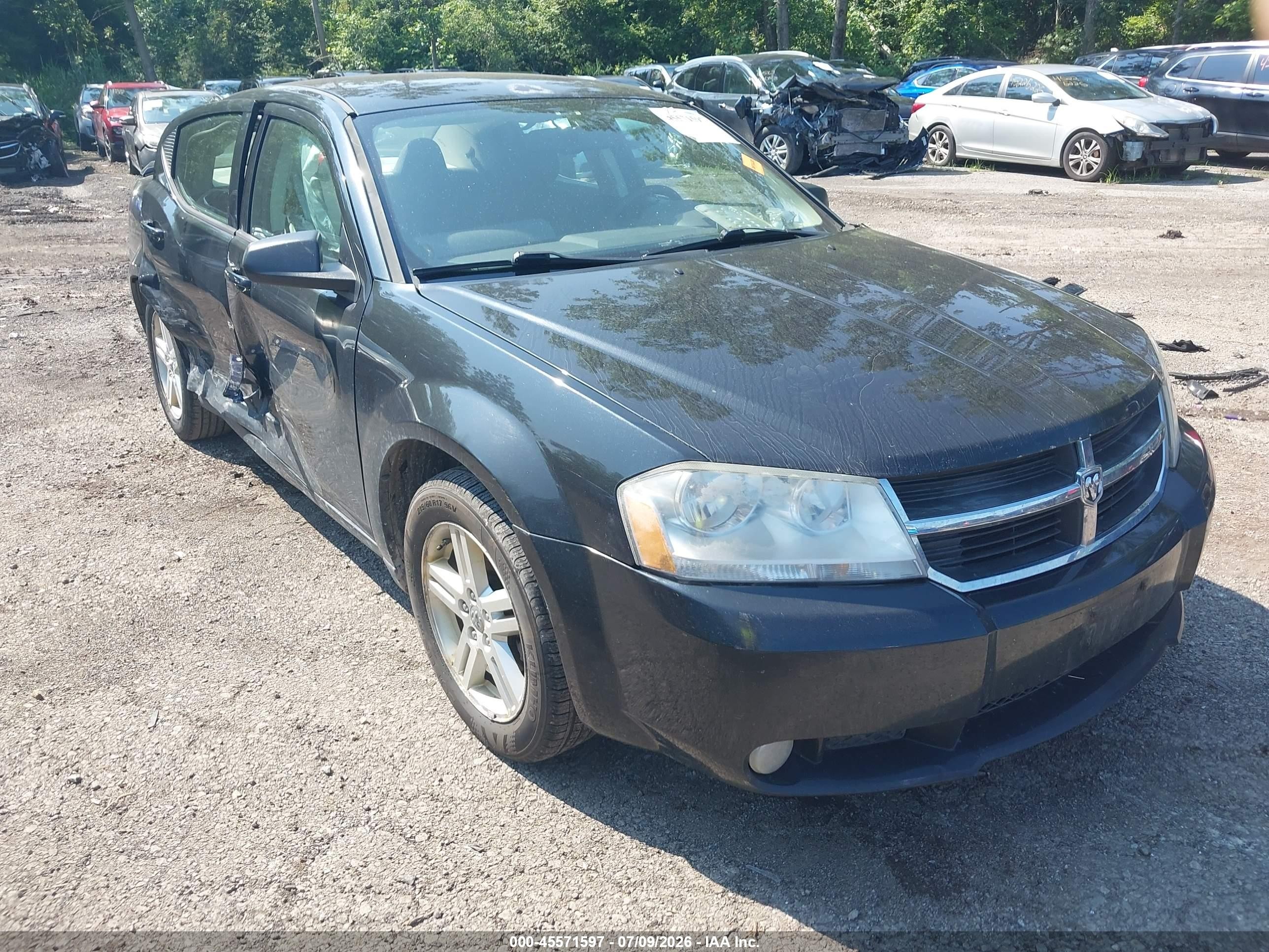 2009 Dodge Avenger SXT, VIN 1B3LC56B19N526097 — Бок