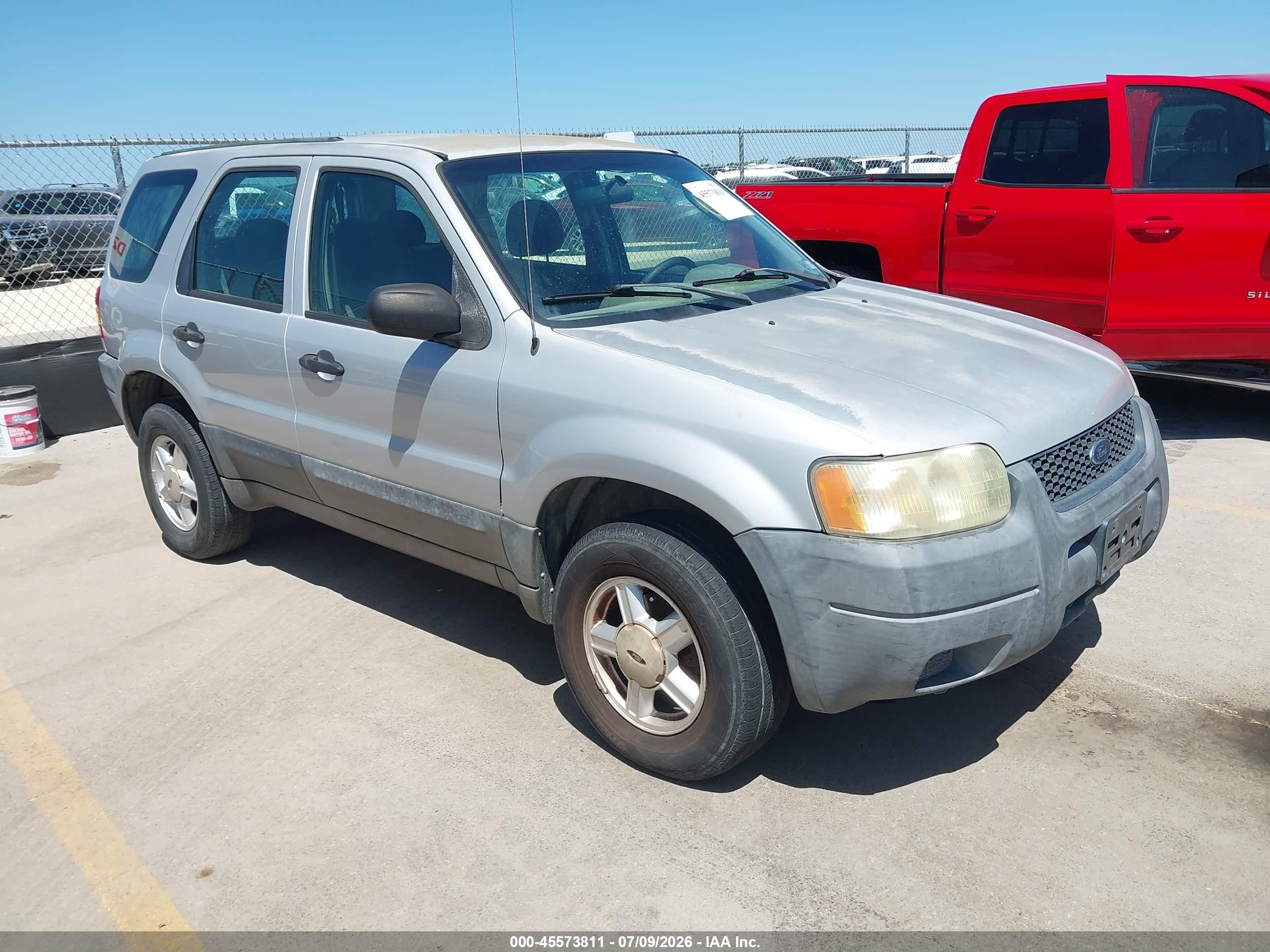 2003 Ford Escape XLS Popular, VIN 1FMYU021X3KD40239 — Вода / потоп