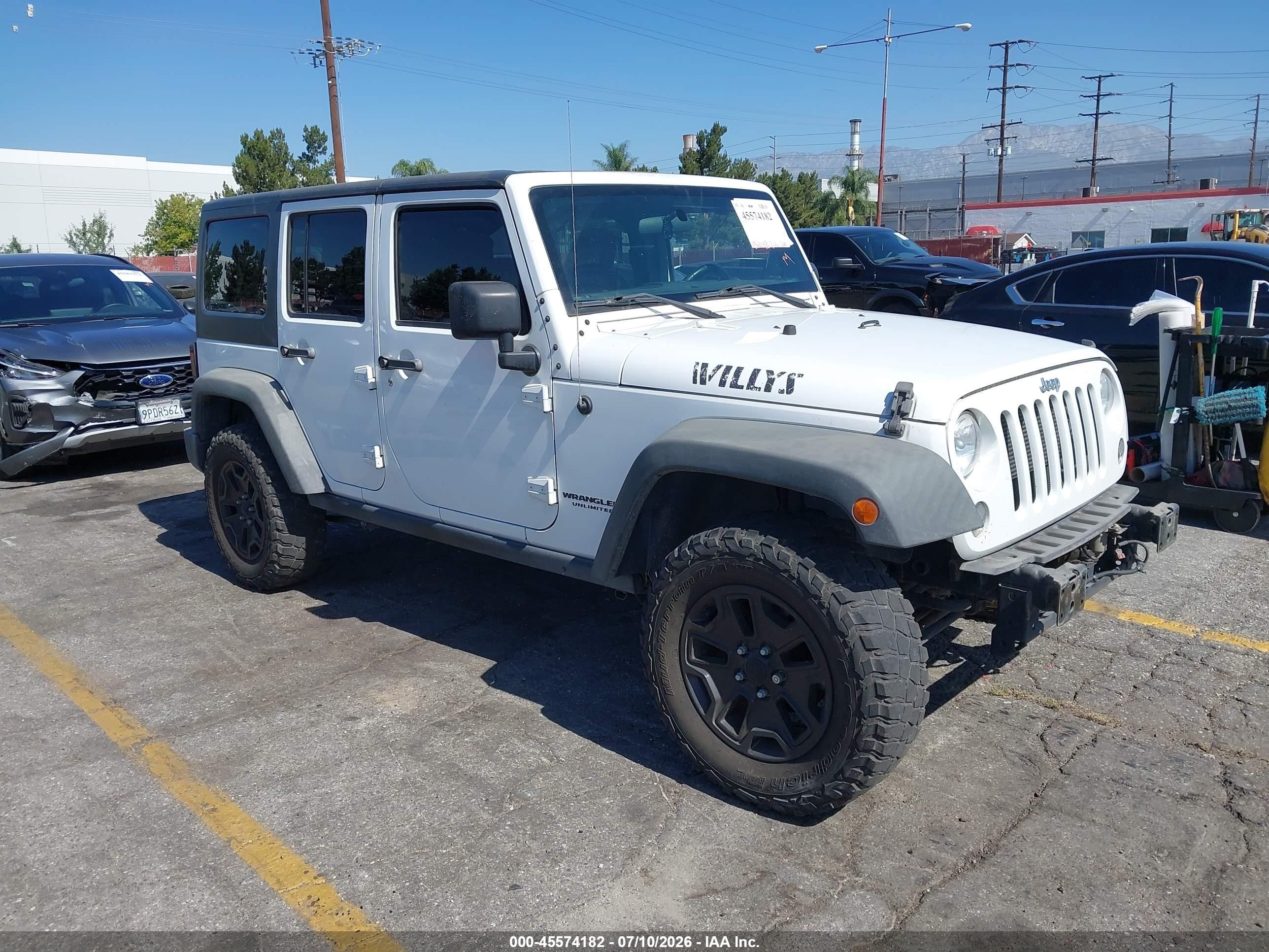 2016 Jeep Wrangler Unlimited Sport, VIN 1C4BJWDG5GL240119 — Перед