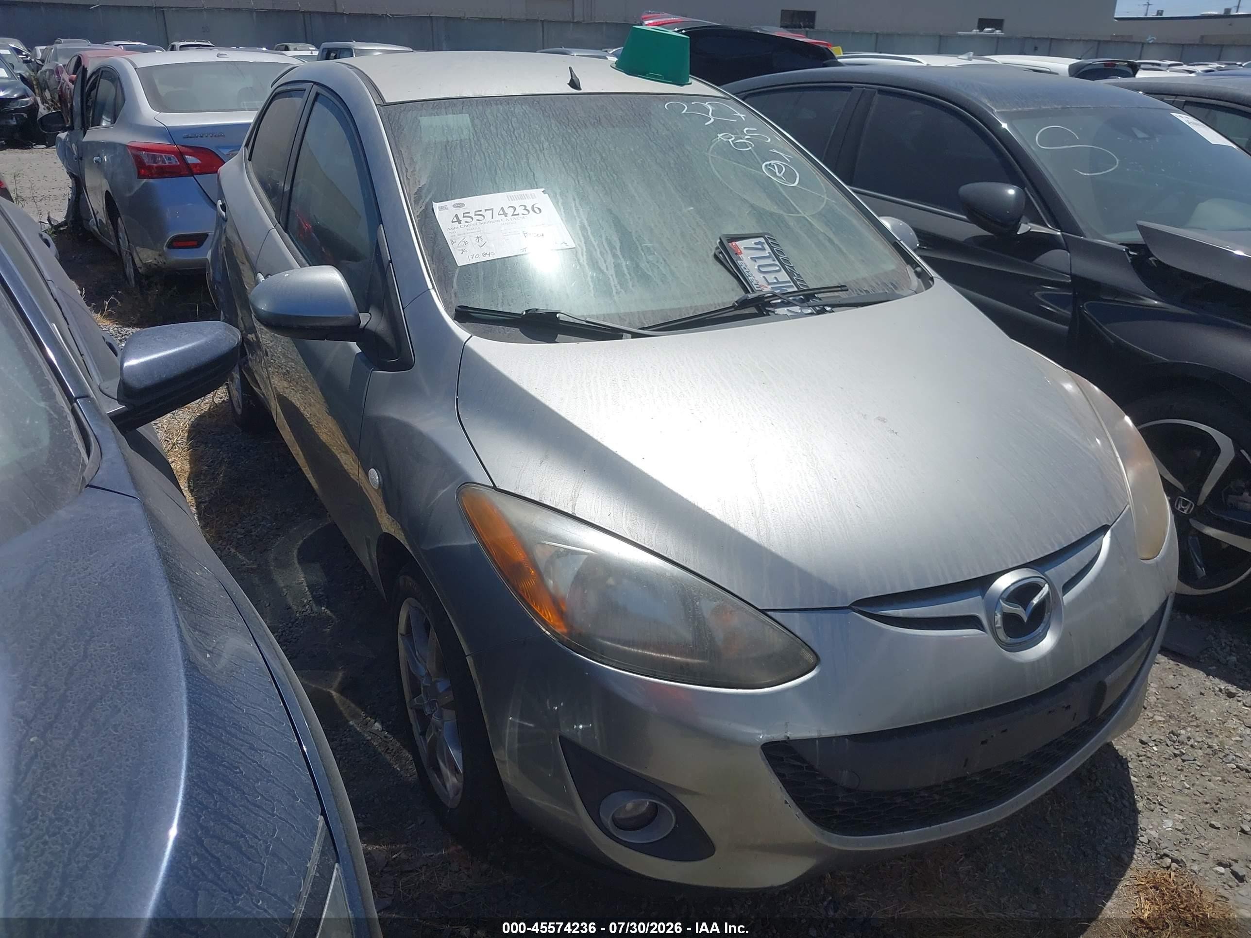 2011 Mazda 2 Sport, VIN JM1DE1HZ5B0119077 — Side