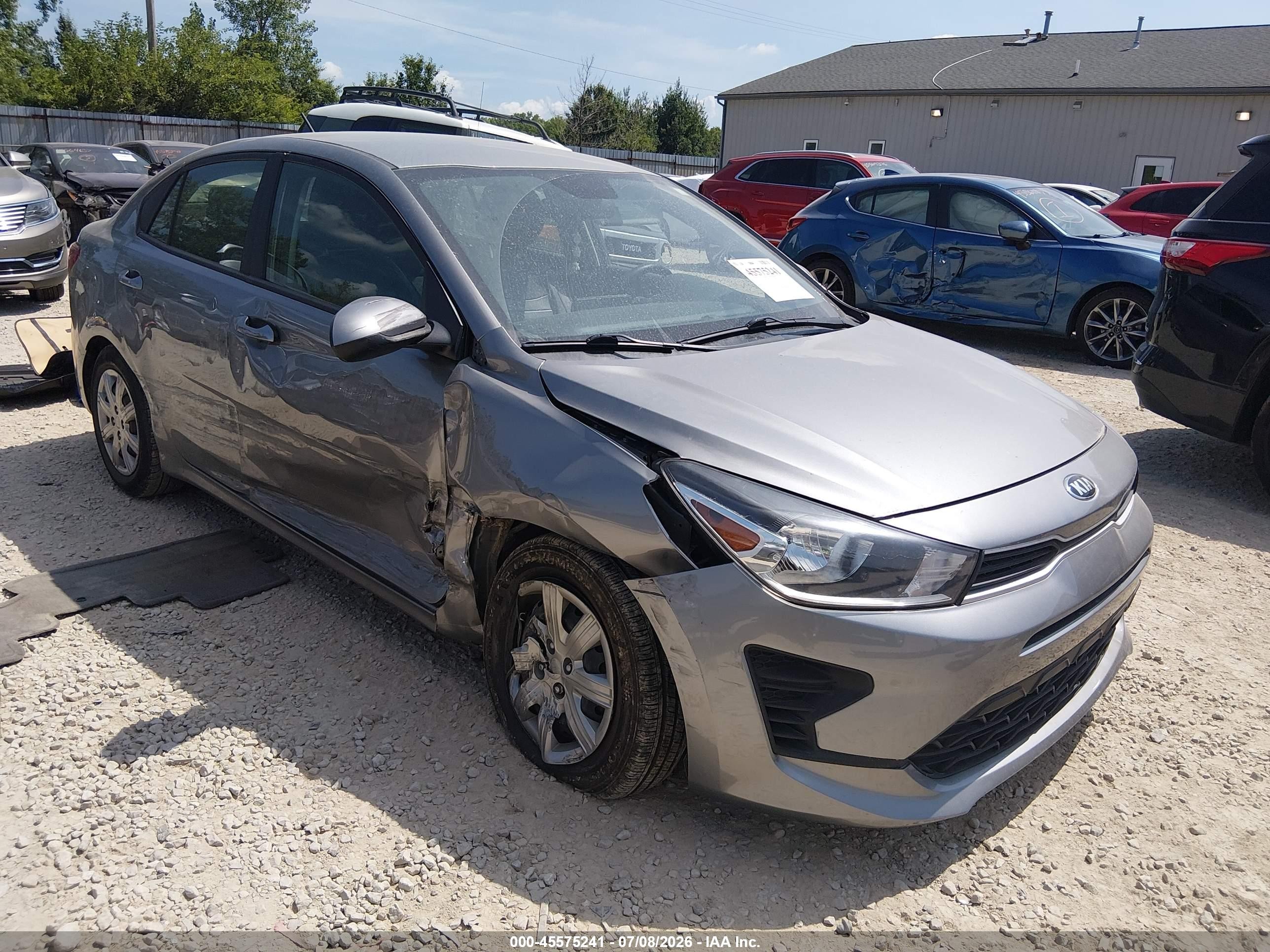 2021 Kia Rio S, VIN 3KPA24AD8ME422117 — Side