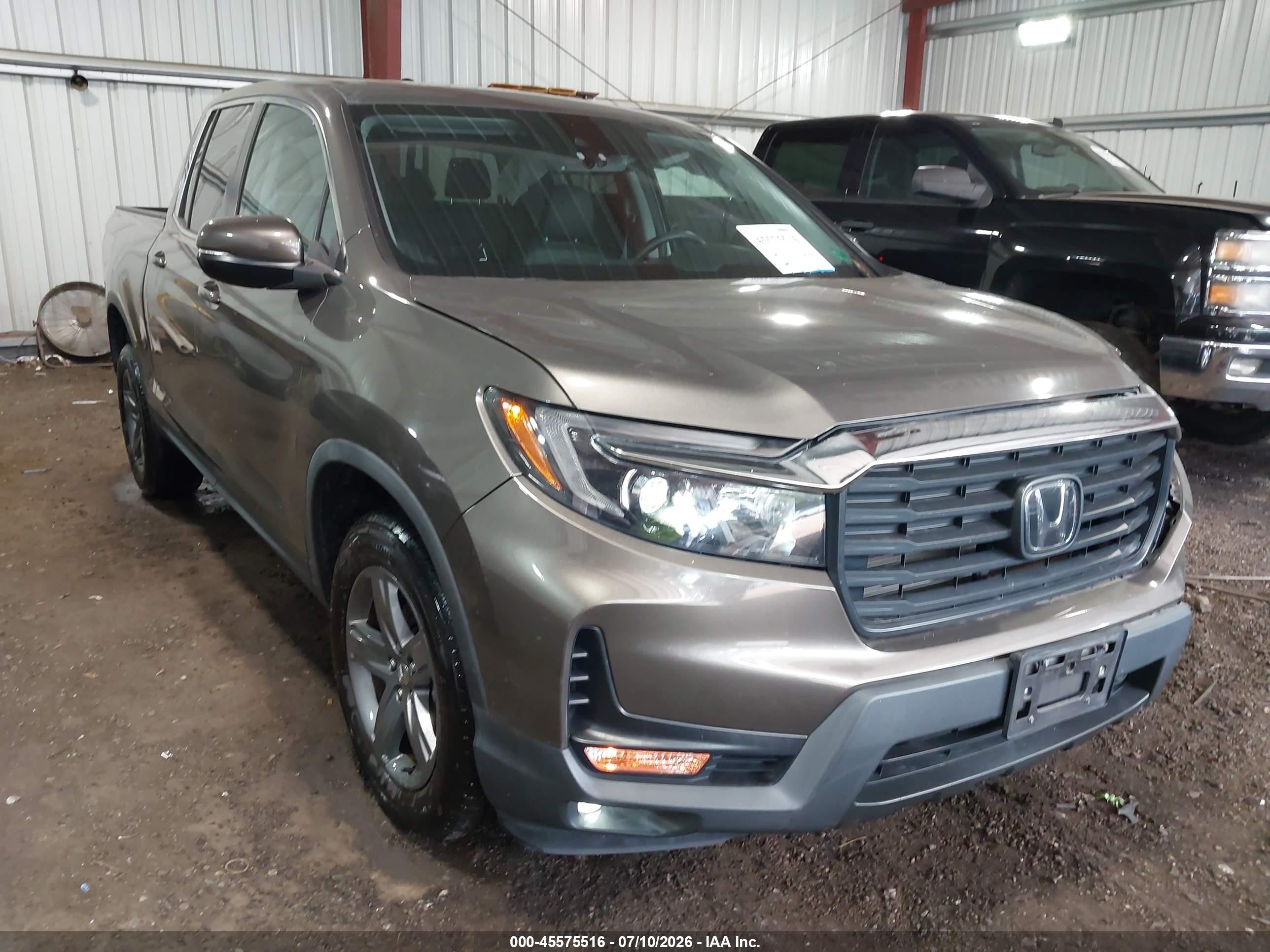 2021 Honda Ridgeline RTL, VIN 5FPYK3F50MB025366 — Front end
