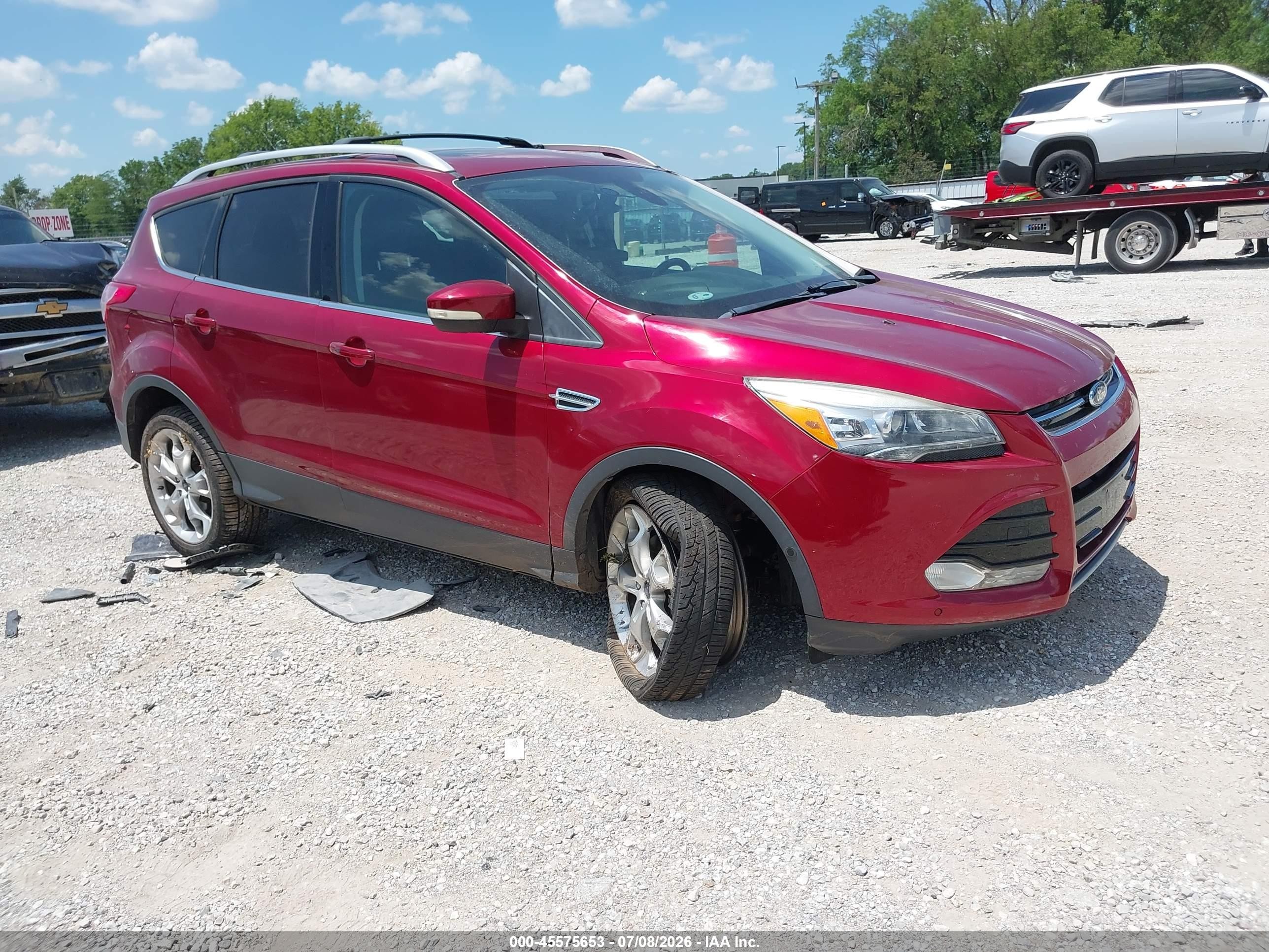 2013 Ford Escape Titanium, VIN 1FMCU0J93DUC23934 — Side