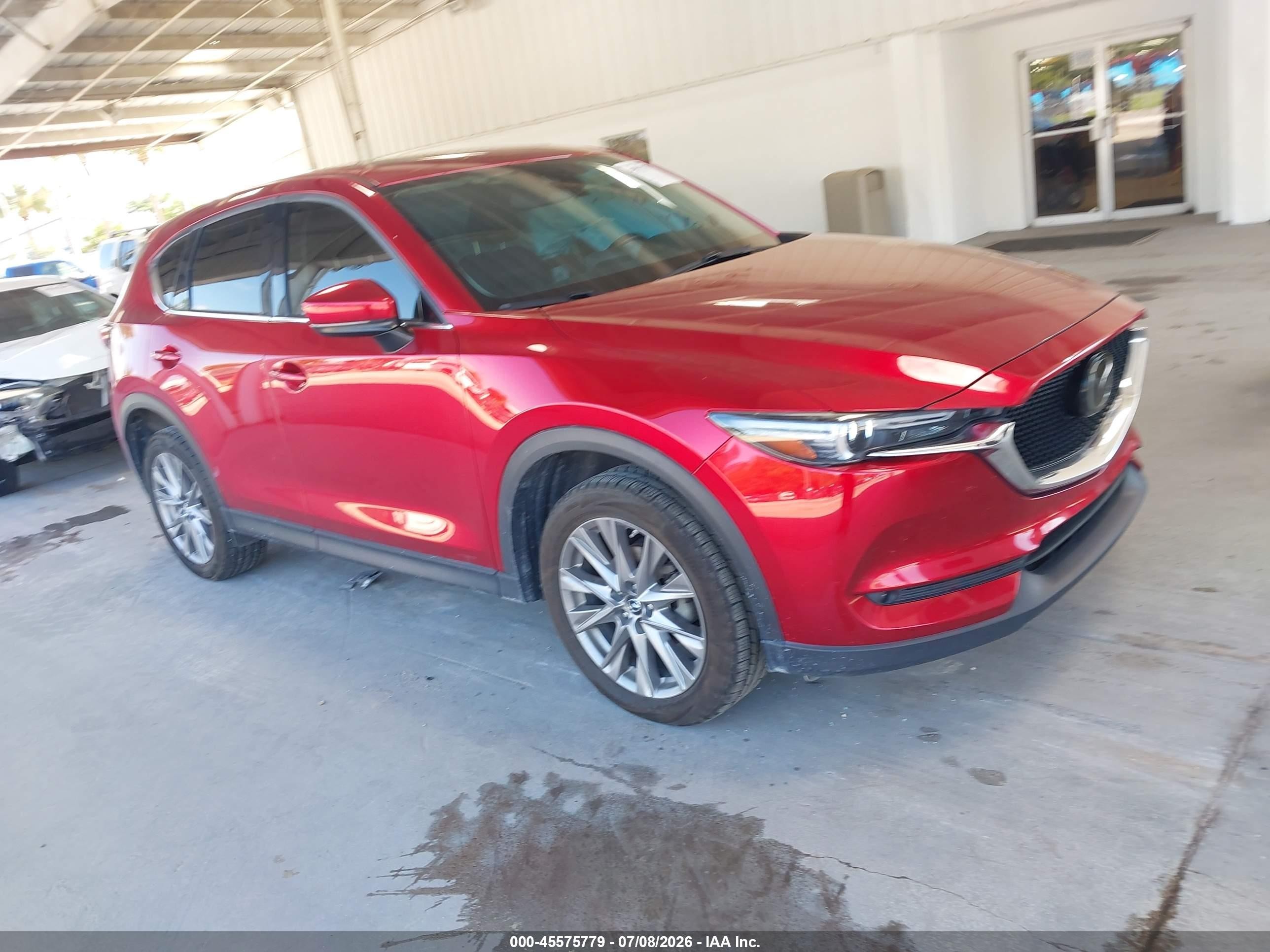 2020 Mazda CX-5 Grand Touring, VIN JM3KFADM6L0848521 — Rear end