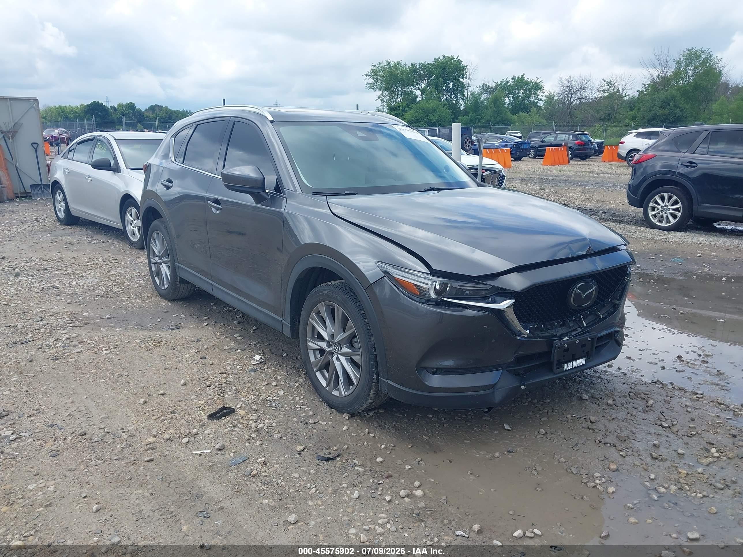 2021 Mazda CX-5 Grand Touring, VIN JM3KFBDM5M1480978 — Front end