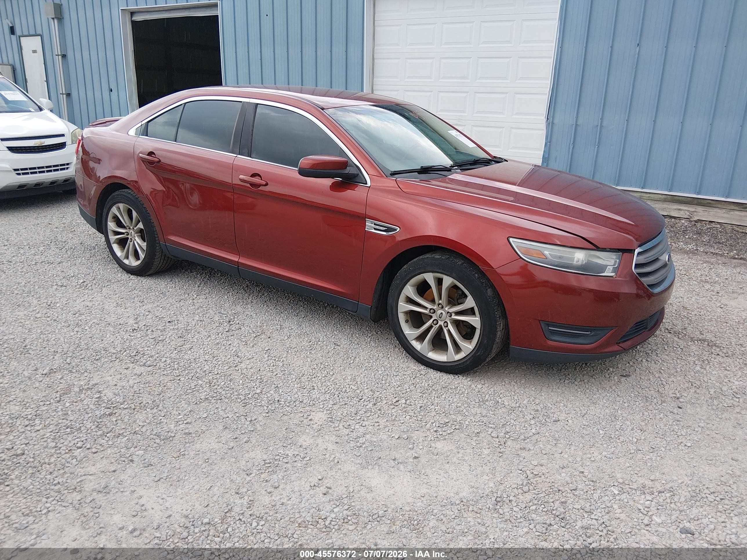 2014 Ford Taurus SEL, VIN 1FAHP2E82EG133579 — Normal wear