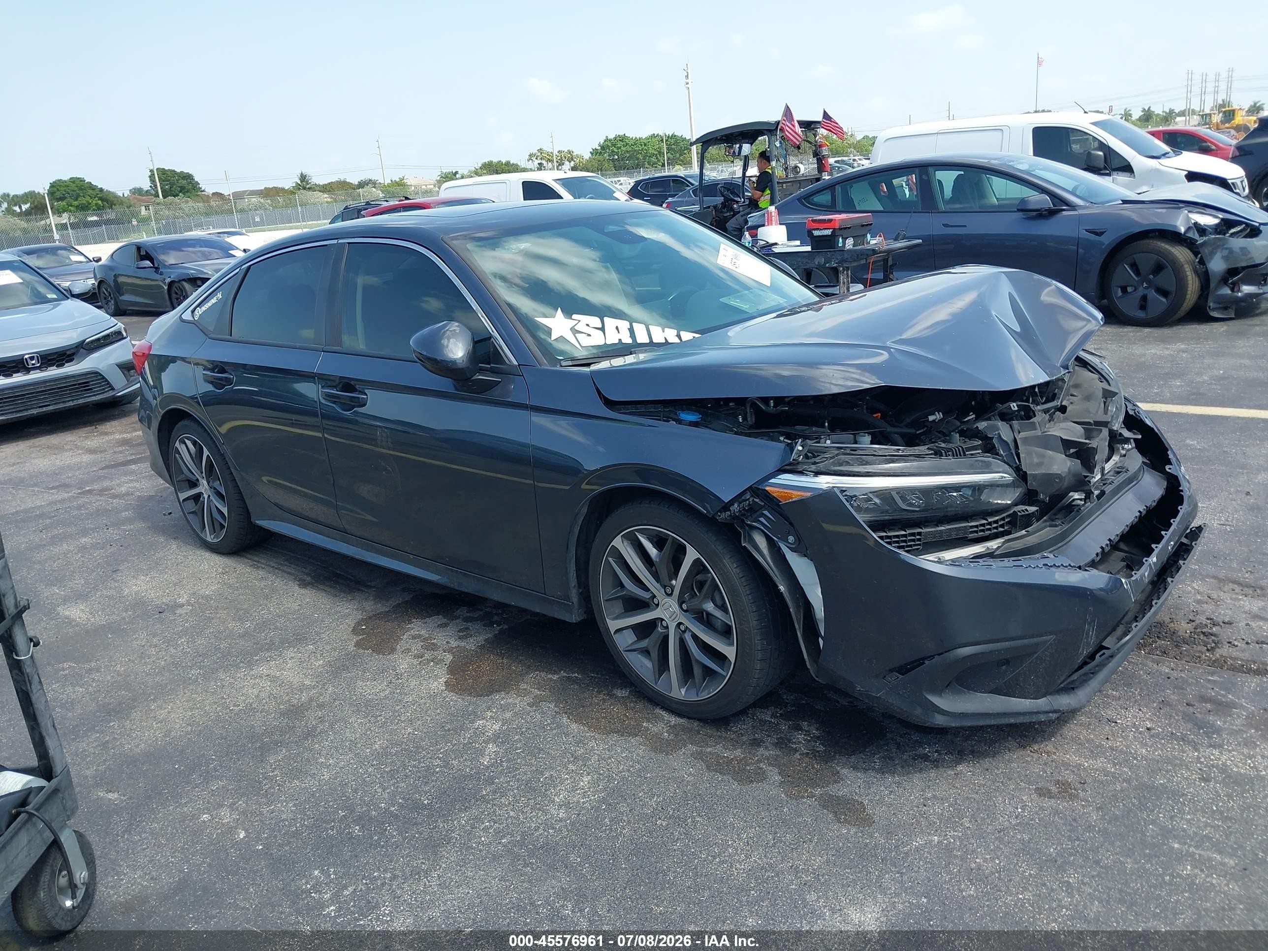 2024 Honda Civic Touring, VIN 2HGFE1F99RH300332 — Front end