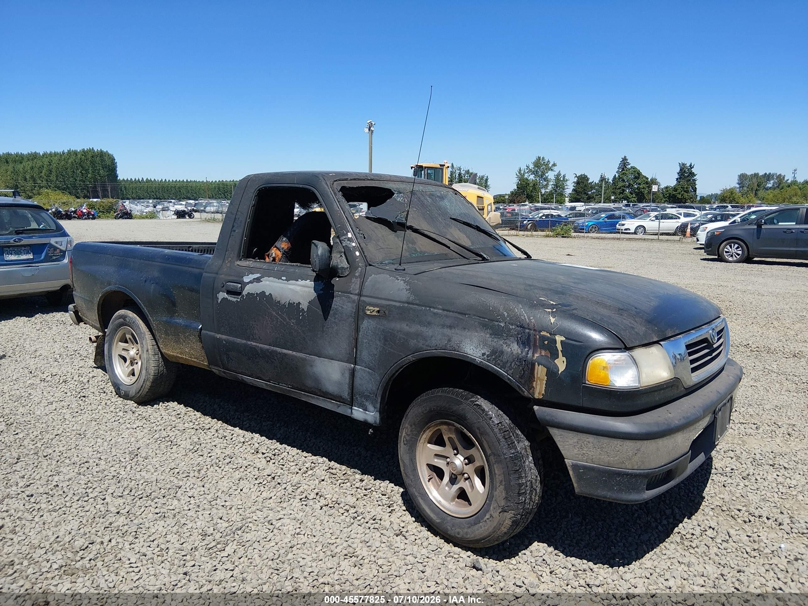 1999 Mazda B-Series SX, VIN 4F4YR12C0XTM24011 — Normal wear