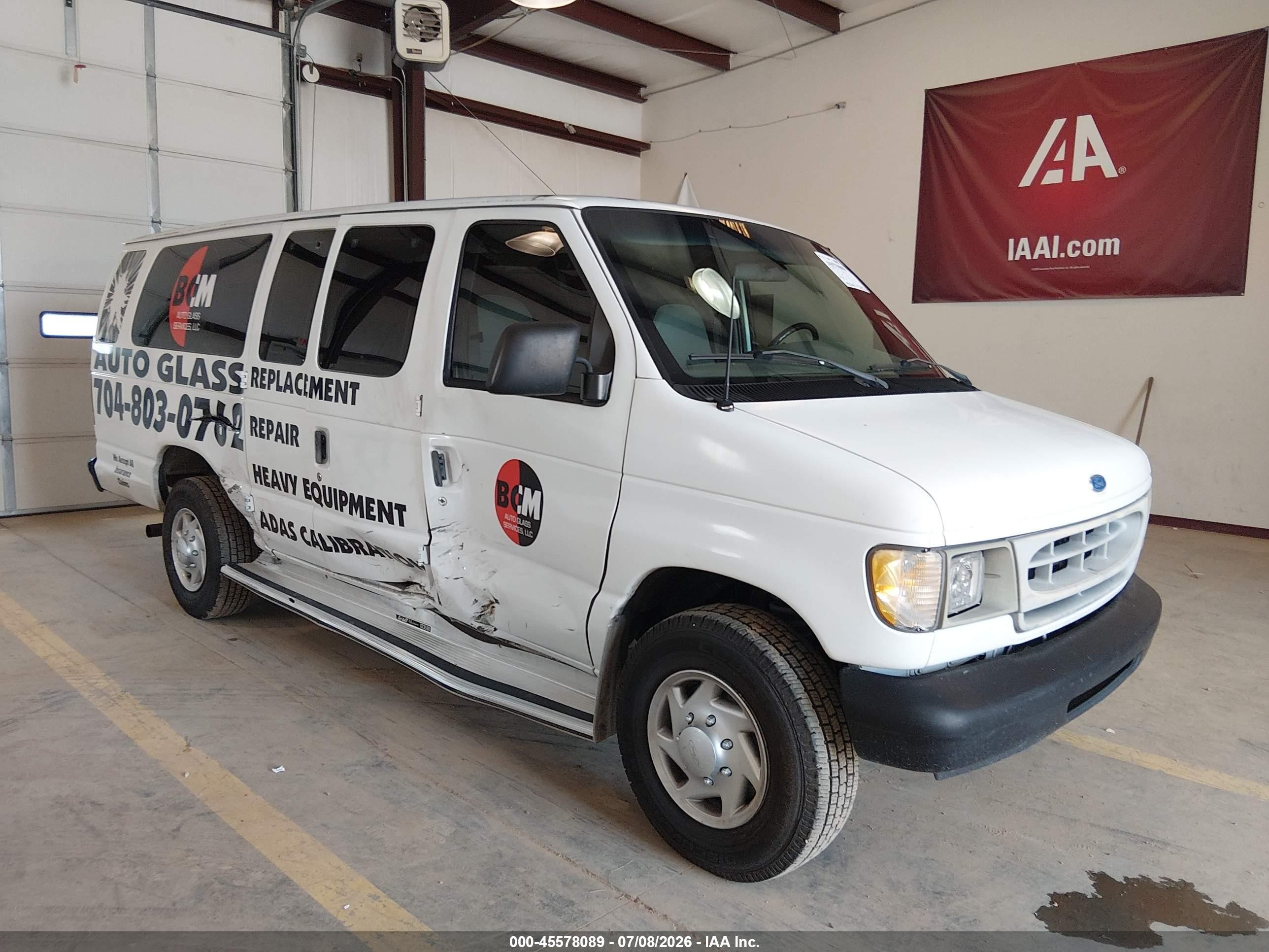 1997 Ford Econoline Wagon XL, VIN 1FBJS31L8VHB13054 — Бок