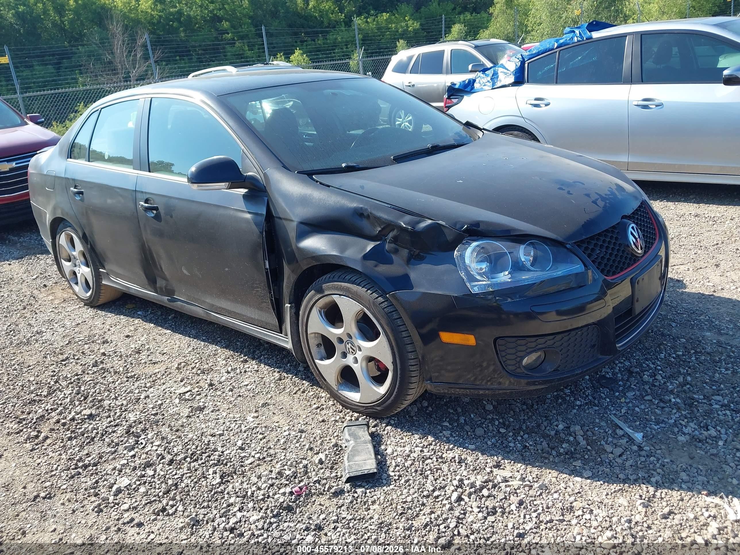 2009 Volkswagen Jetta, VIN 3VWDJ71K29M123569 — Бок