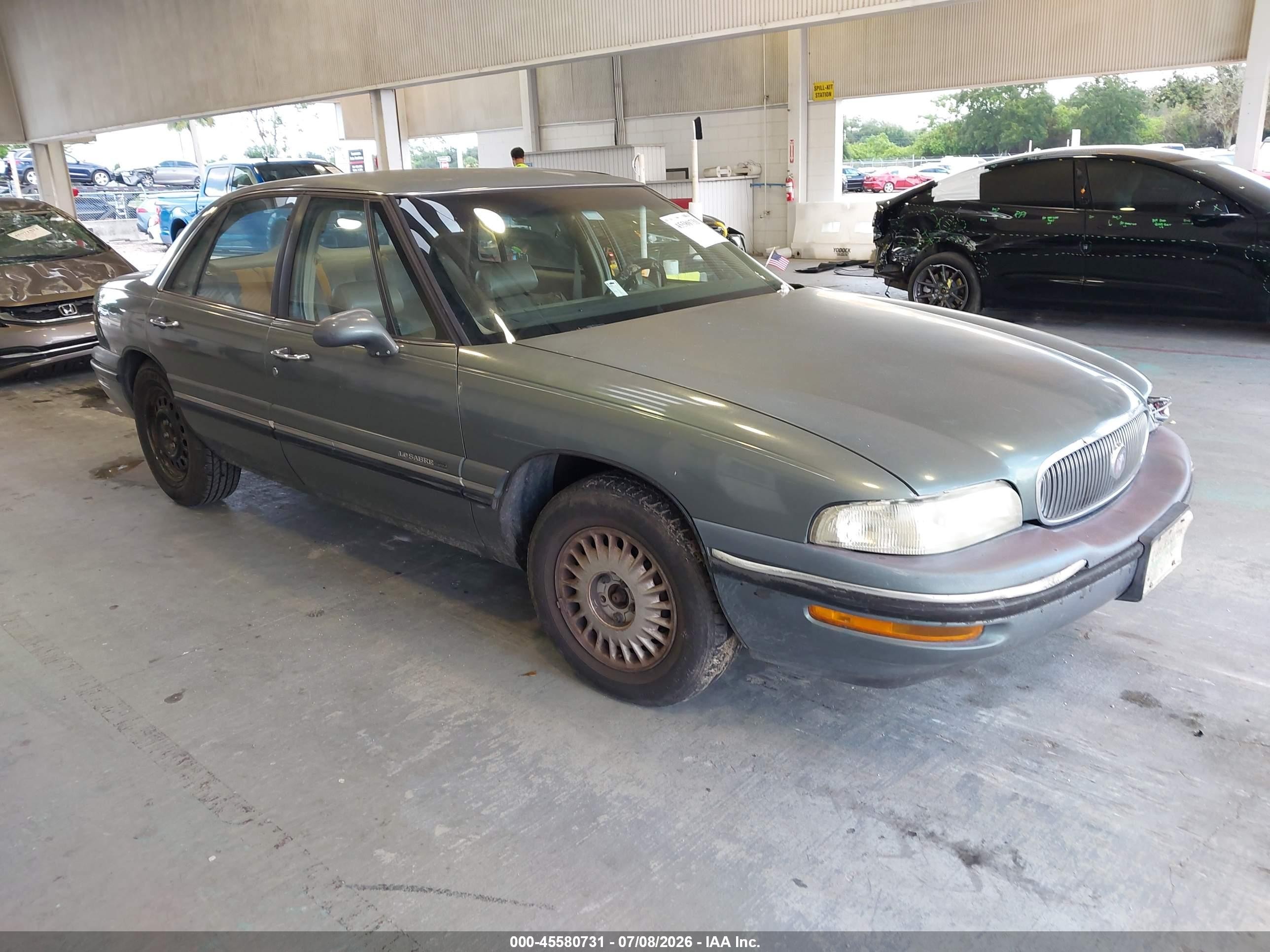 1998 Buick LeSabre Custom, VIN 1G4HP52K1WH533054 — Side