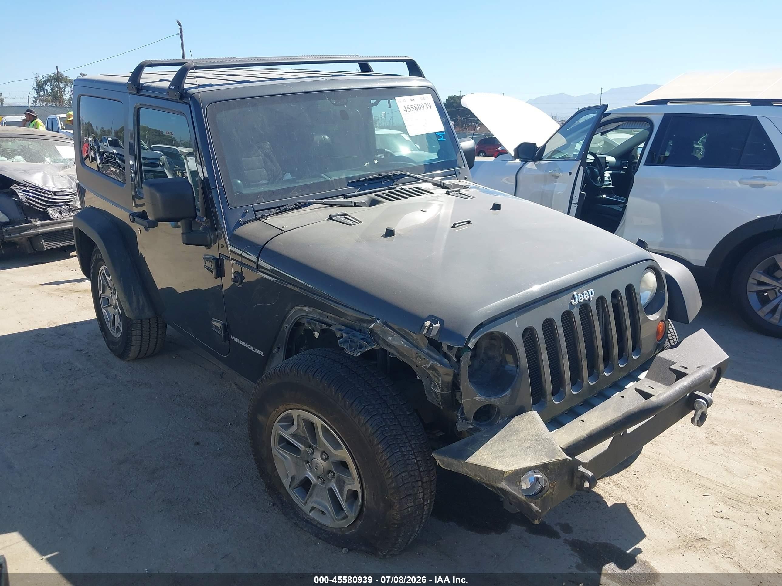 2010 Jeep Wrangler Islander, VIN 1J4AA2D19AL127517 — Front end