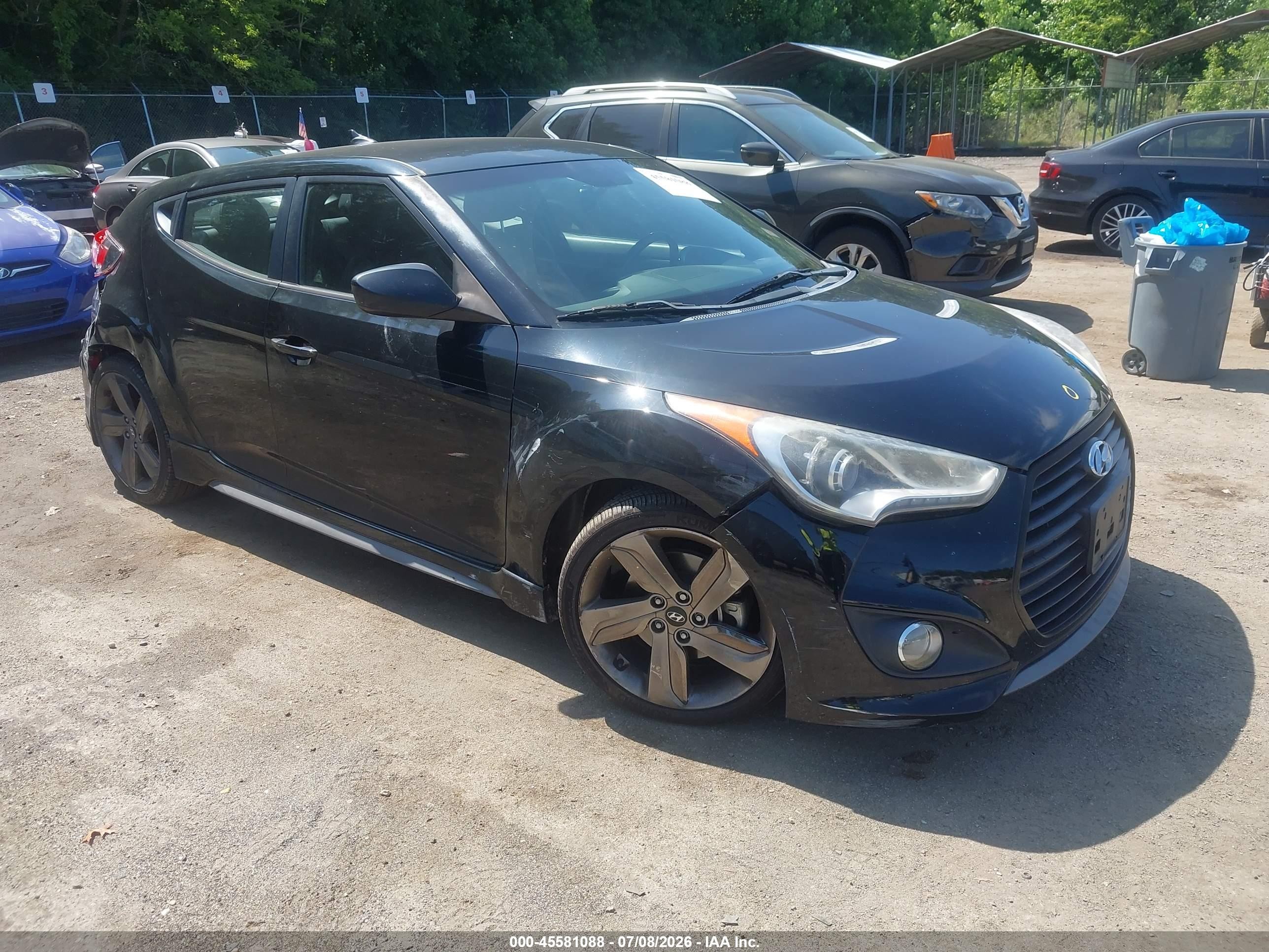 2014 Hyundai Veloster Turbo, VIN KMHTC6AE3EU199803 — Зад