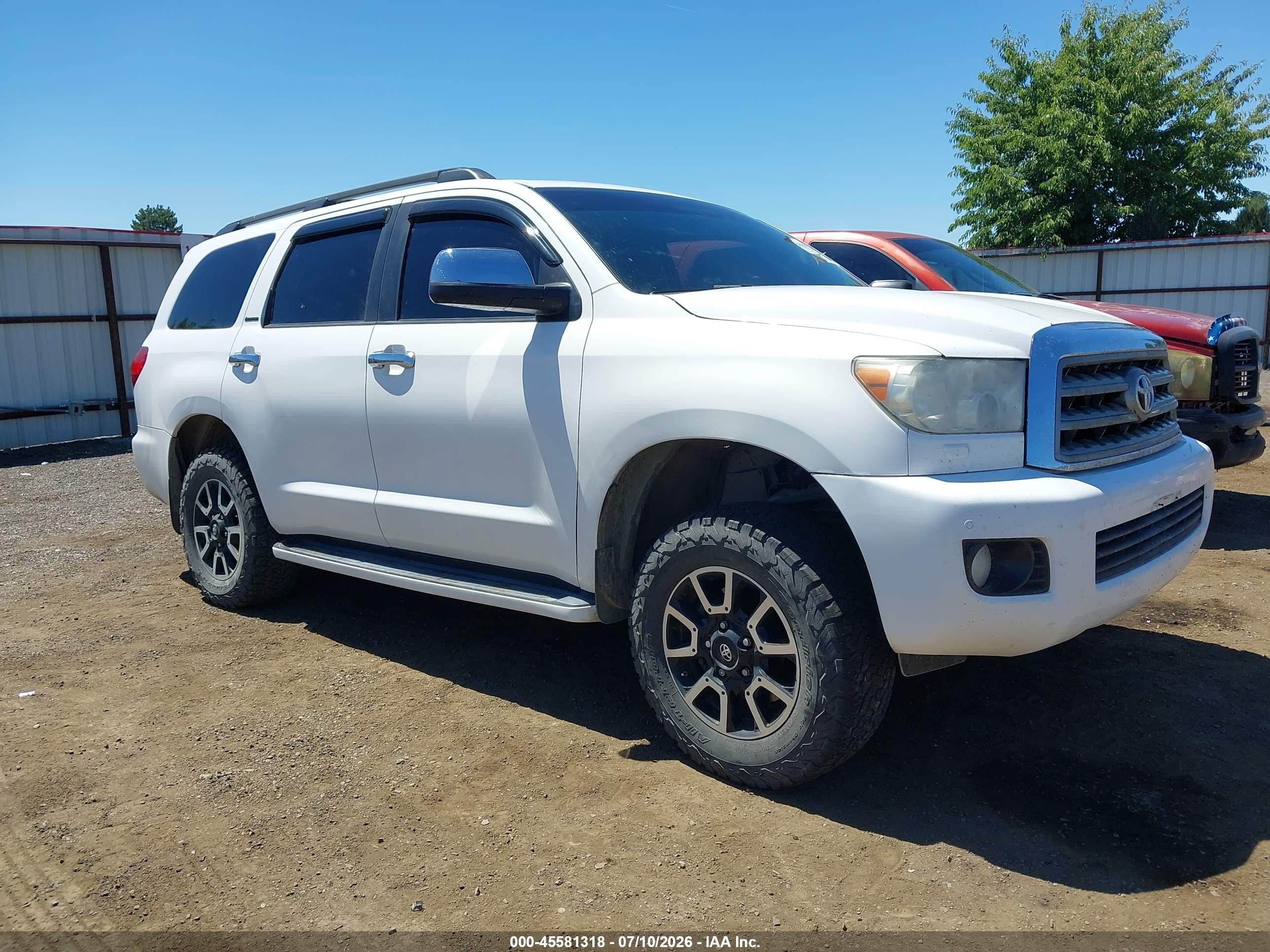 2012 Toyota Sequoia Limited, VIN 5TDJY5G17CS066281 — Бок