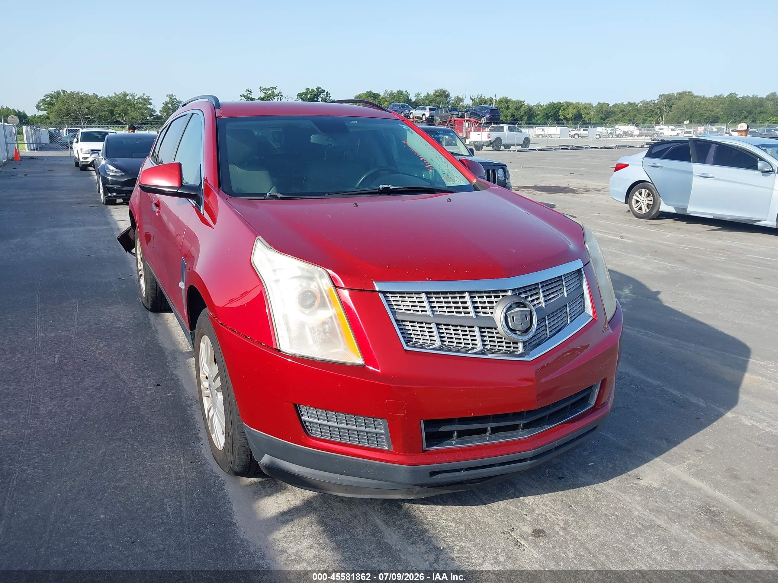 2012 Cadillac SRX, VIN 3GYFNGE31CS530301 — Rear end