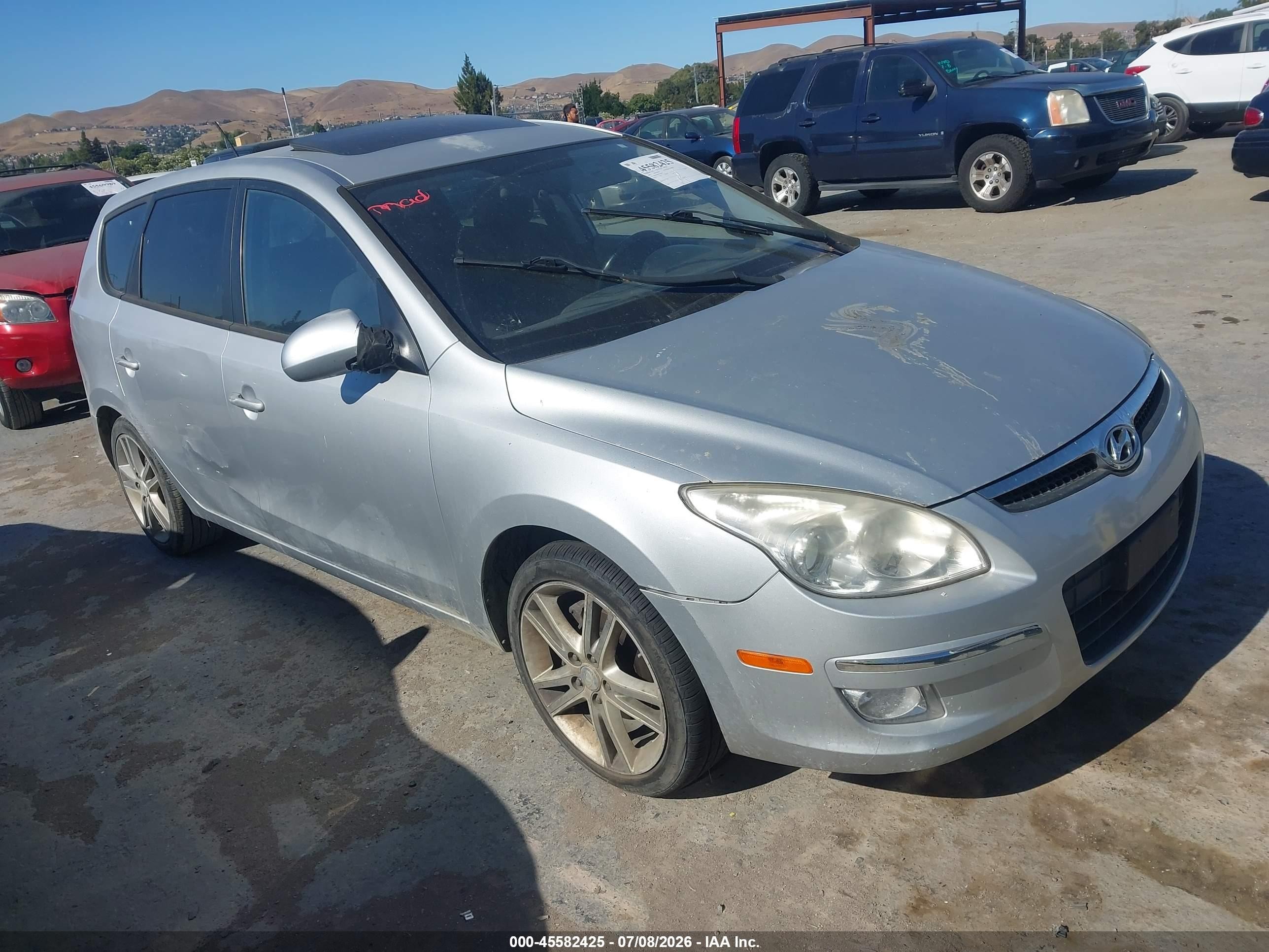 2009 Hyundai Elantra Touring, VIN KMHDC86E29U026949 — Normal wear