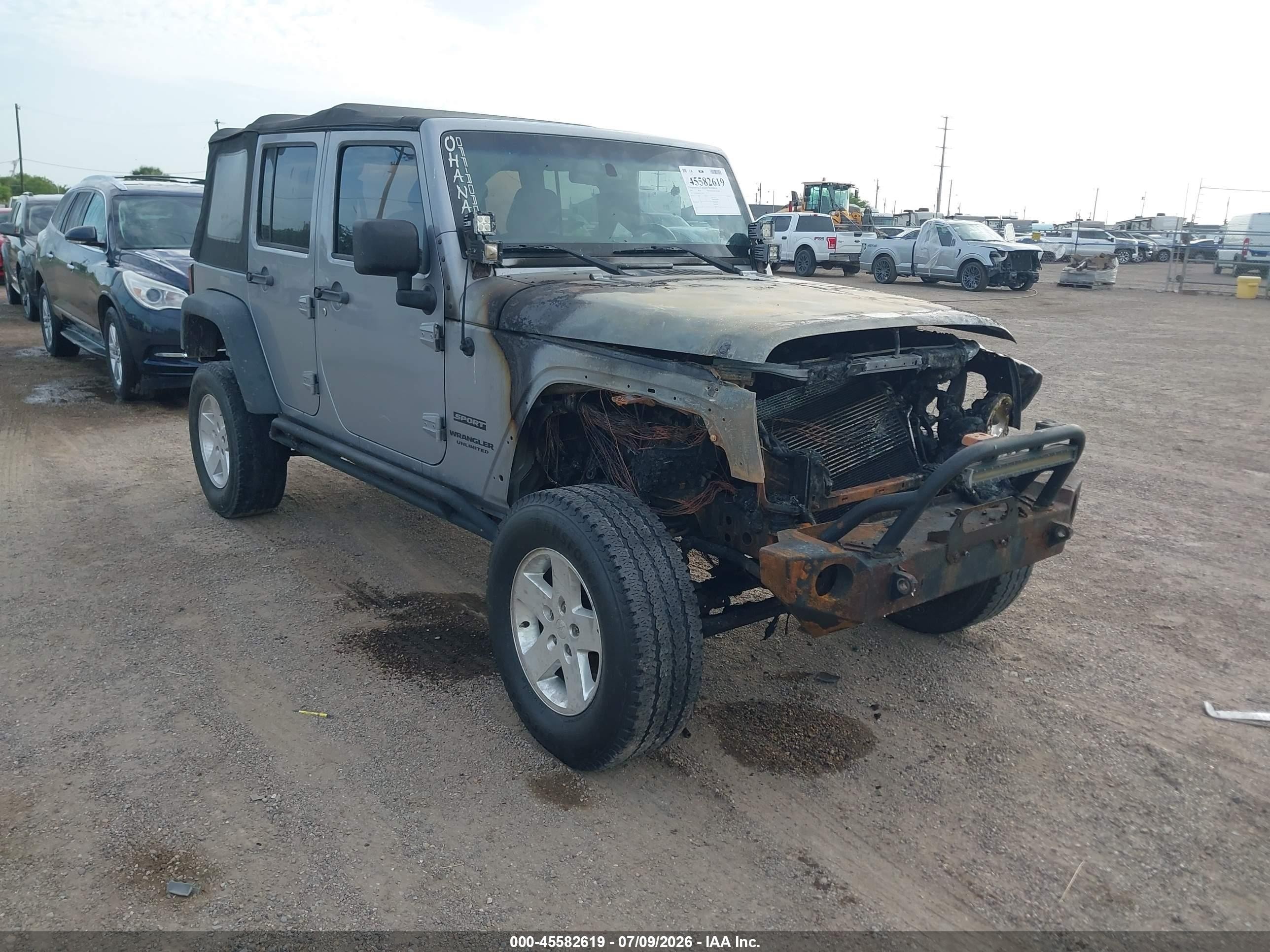 2014 Jeep Wrangler Unlimited Sport, VIN 1C4HJWDGXEL133333 — Engine fire