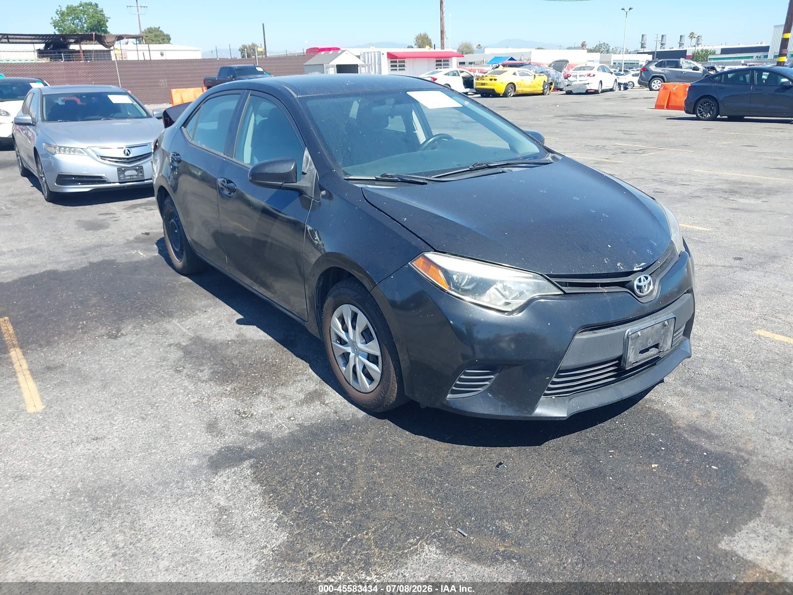 2015 Toyota Corolla LE, VIN 5YFBURHE0FP211683 — Rear end