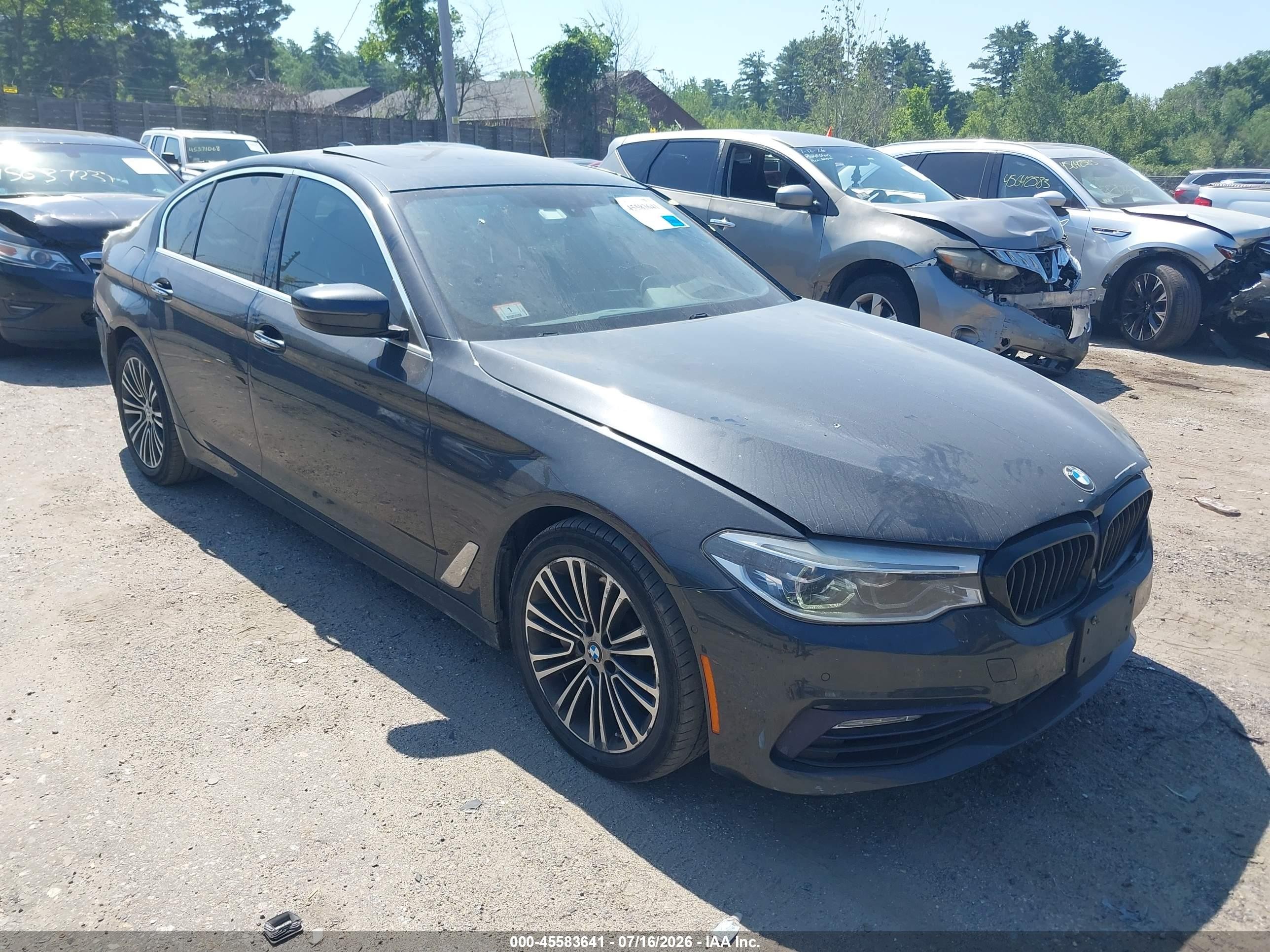 2017 BMW 5 Series 540i xDrive, VIN WBAJE7C33HG887372 — Rear end