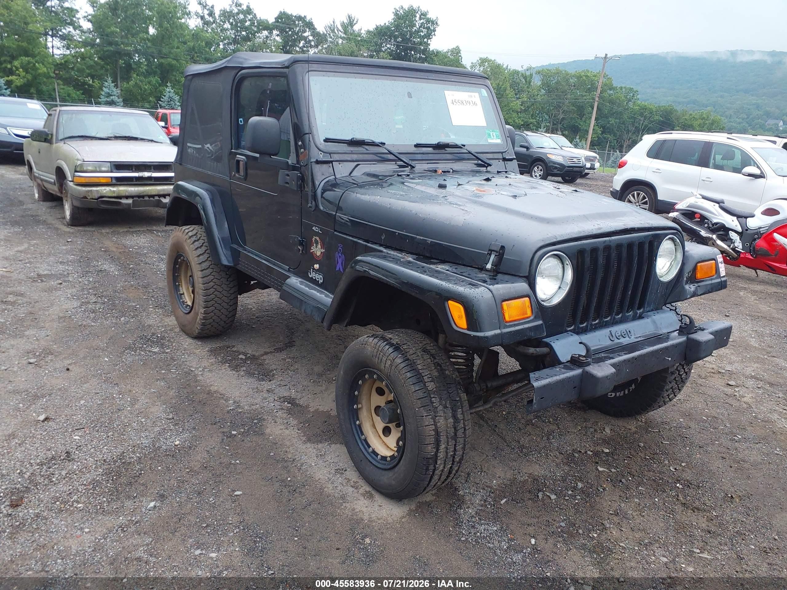 2000 Jeep Wrangler Sahara, VIN 1J4FA59S6YP721512 — Пожар в моторном отсеке
