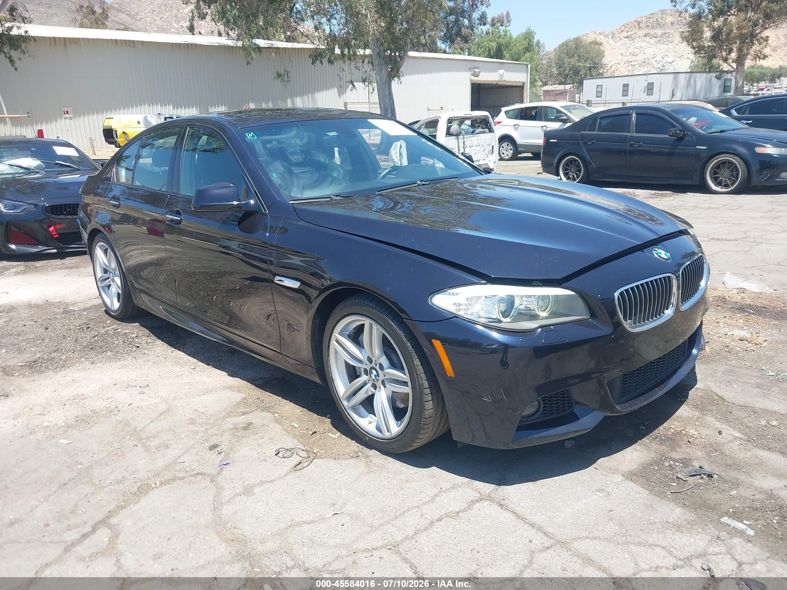 2013 BMW 5 Series 535i, VIN WBAFR7C50DC817888 — Зад