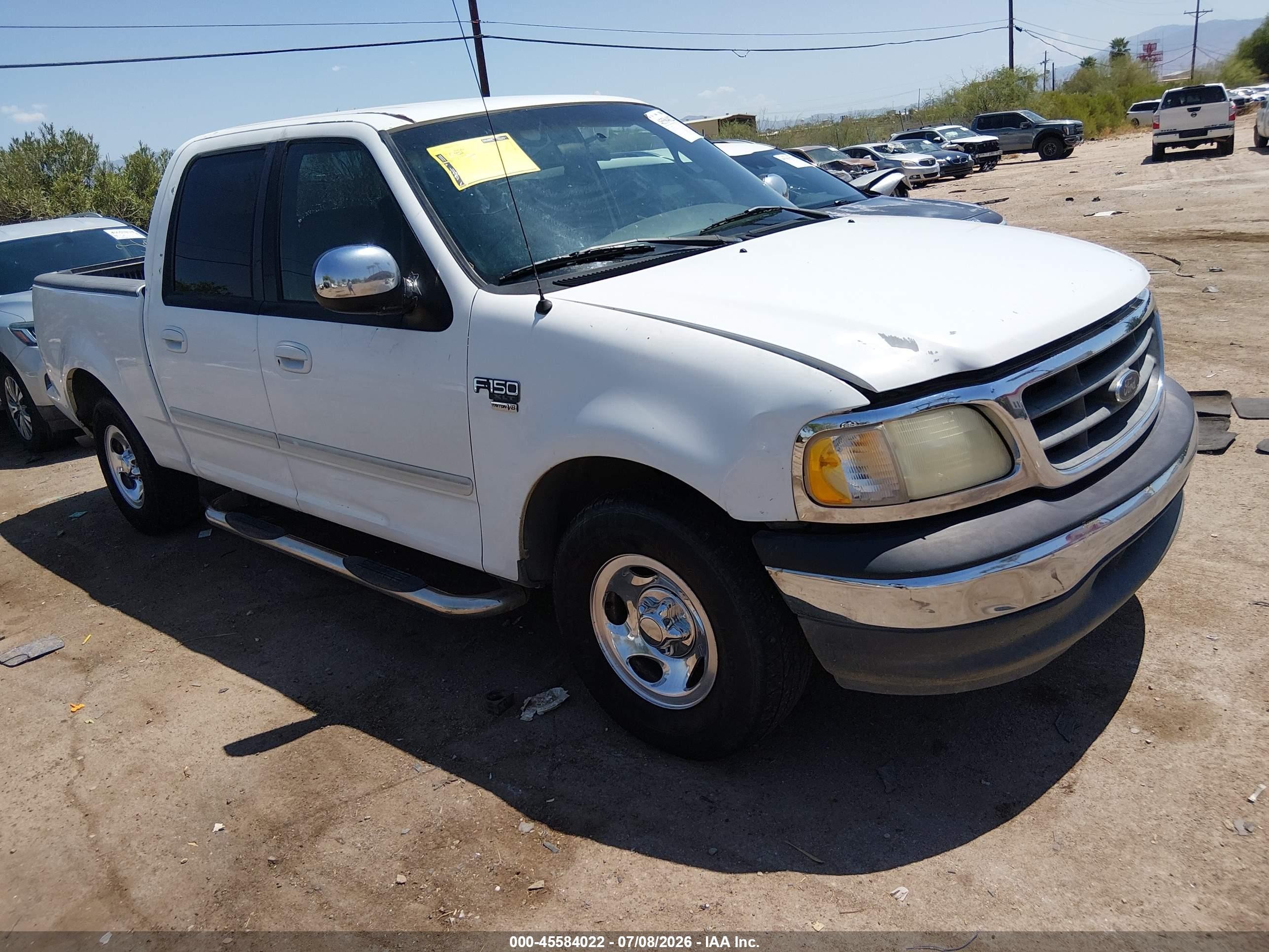 2001 Ford F-150 XLT, VIN 1FTRW07L21KB56410 — Side