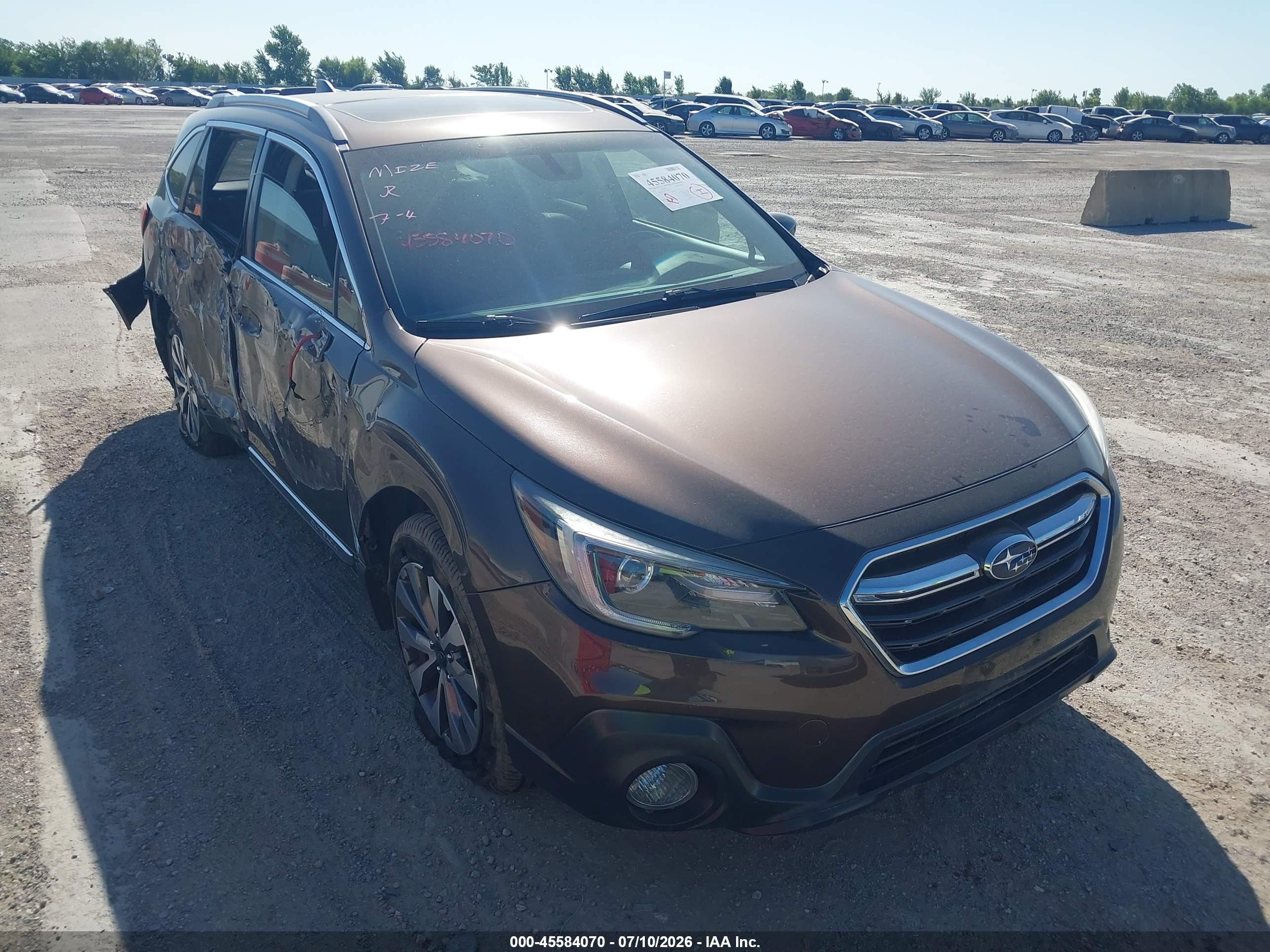 2019 Subaru Outback Touring, VIN 4S4BSETC4K3355823 — Side