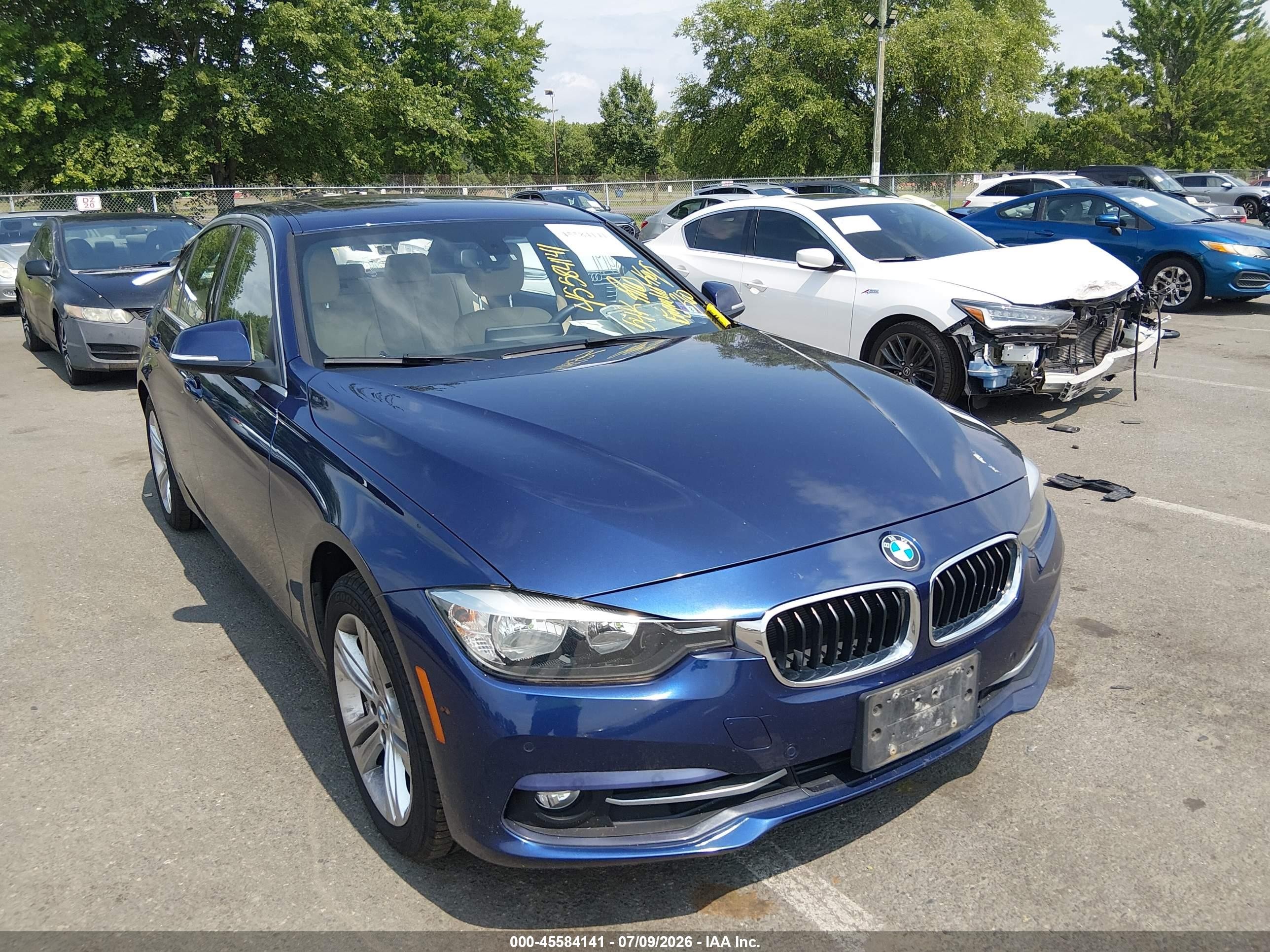 2017 BMW 3 Series 330i xDrive, VIN WBA8D9G37HNU61672 — Rear end