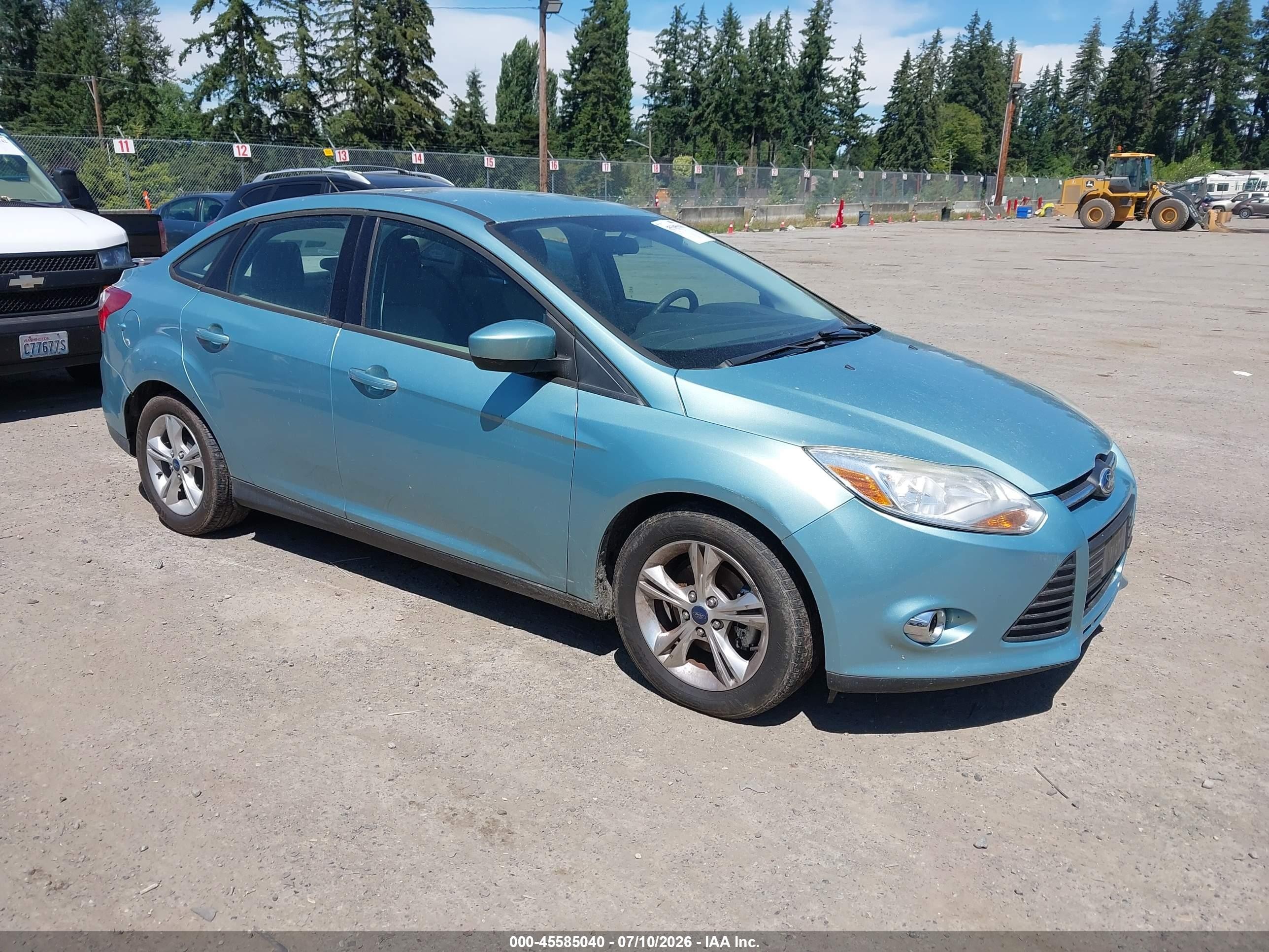 2012 Ford Focus SE, VIN 1FAHP3F20CL411285 — Normal wear