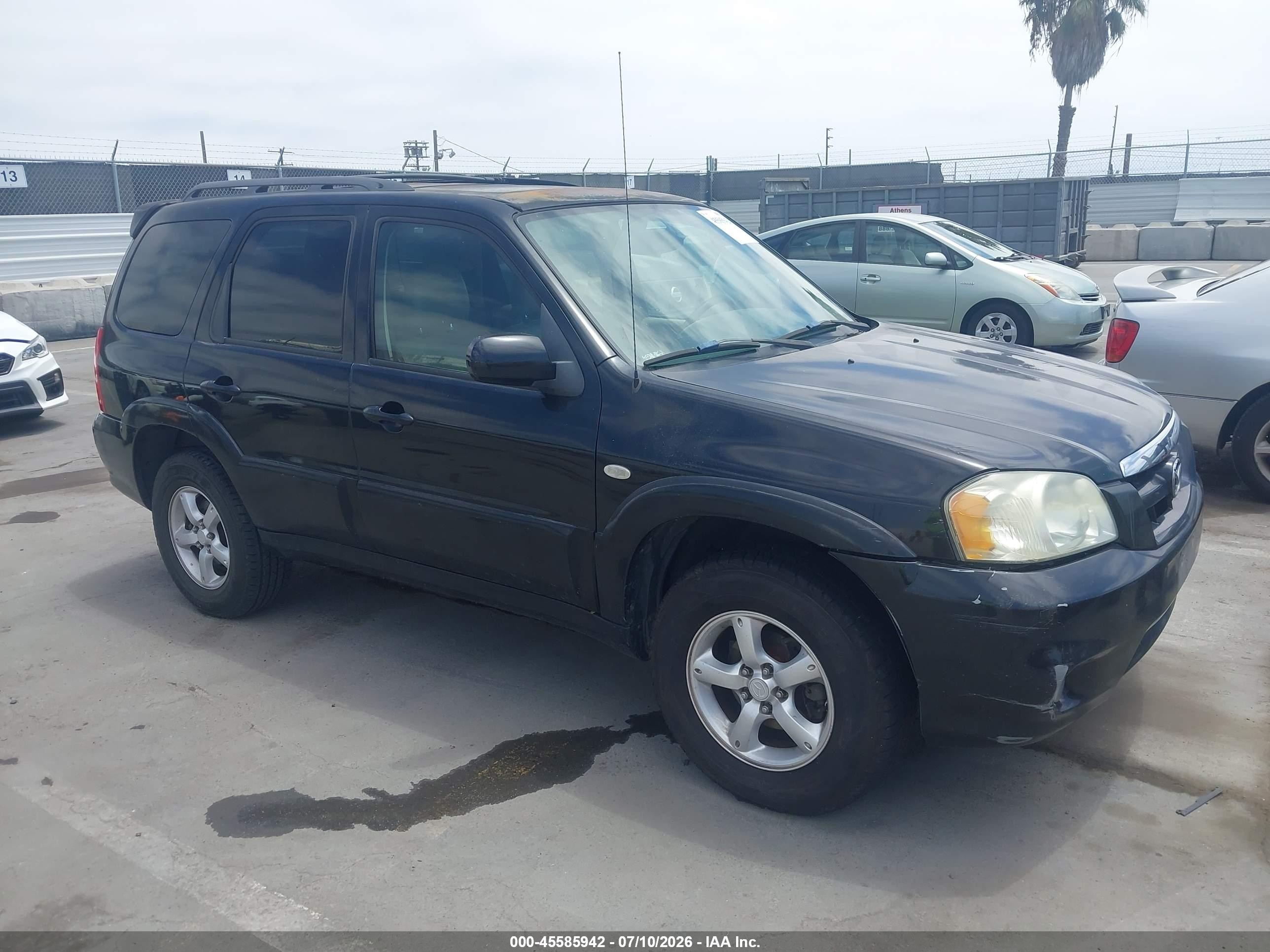 2006 Mazda Tribute Sport, VIN 4F2CZ06116KM02223 — Rear end