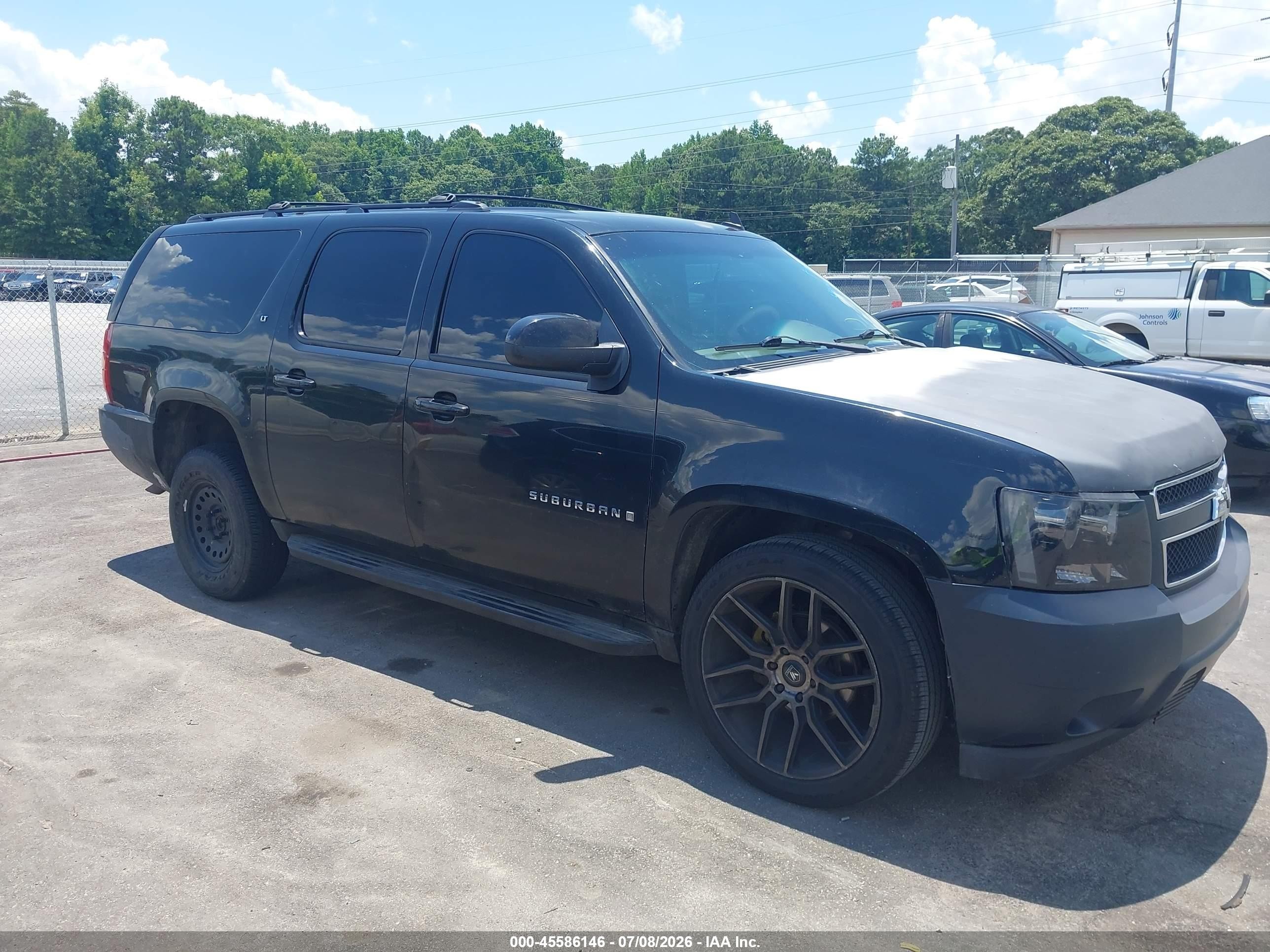 2009 Chevrolet Suburban 1LT, VIN 1GNFC26049R275620 — Normal wear