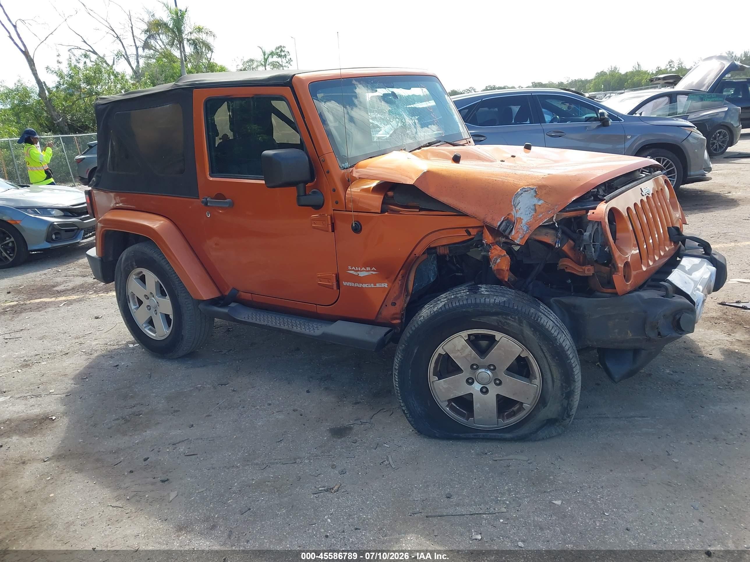 2011 Jeep Wrangler Sahara, VIN 1J4AA5D16BL606349 — Front end