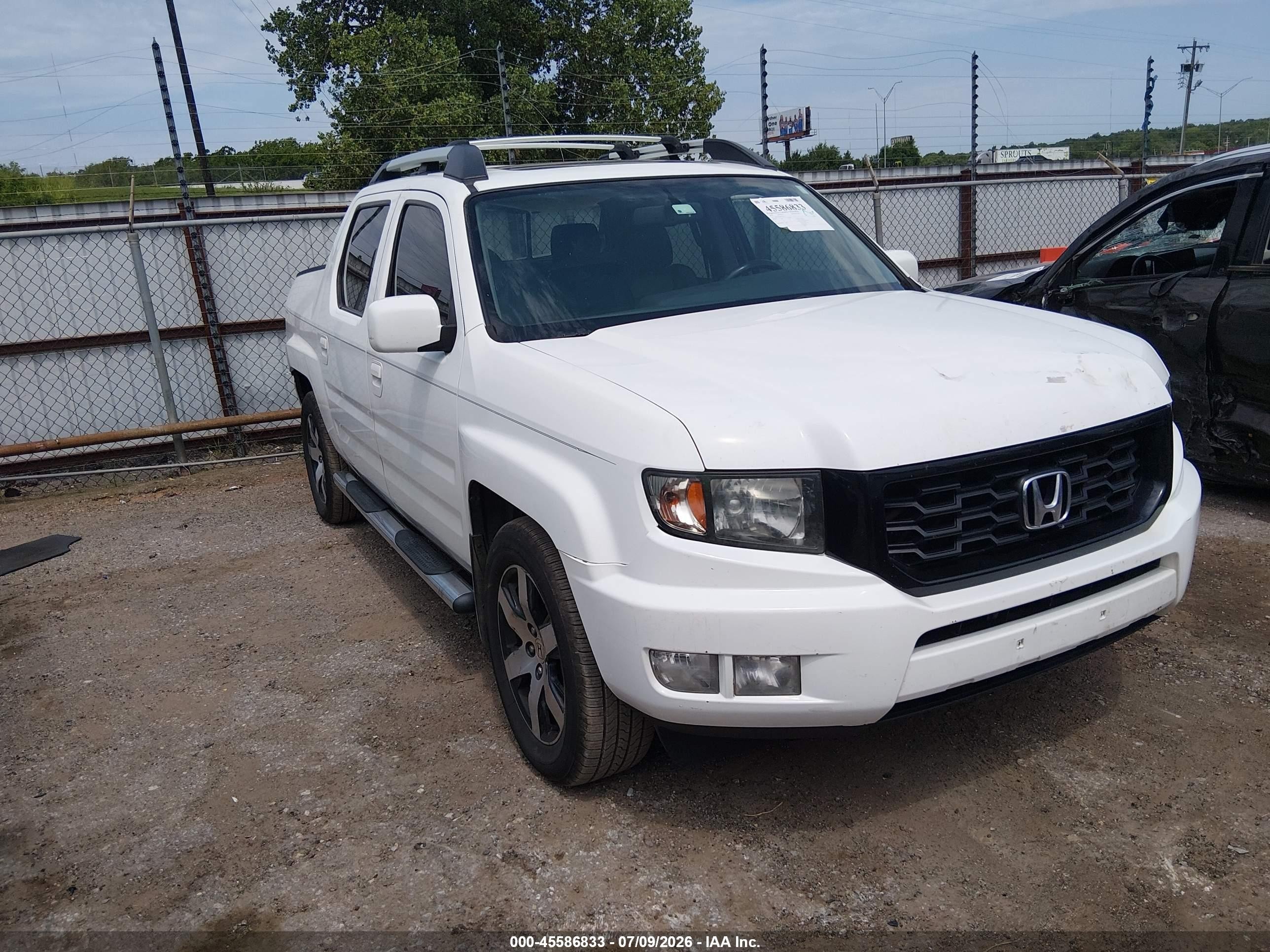 2014 Honda Ridgeline SE, VIN 5FPYK1F68EB013271 — Rear end