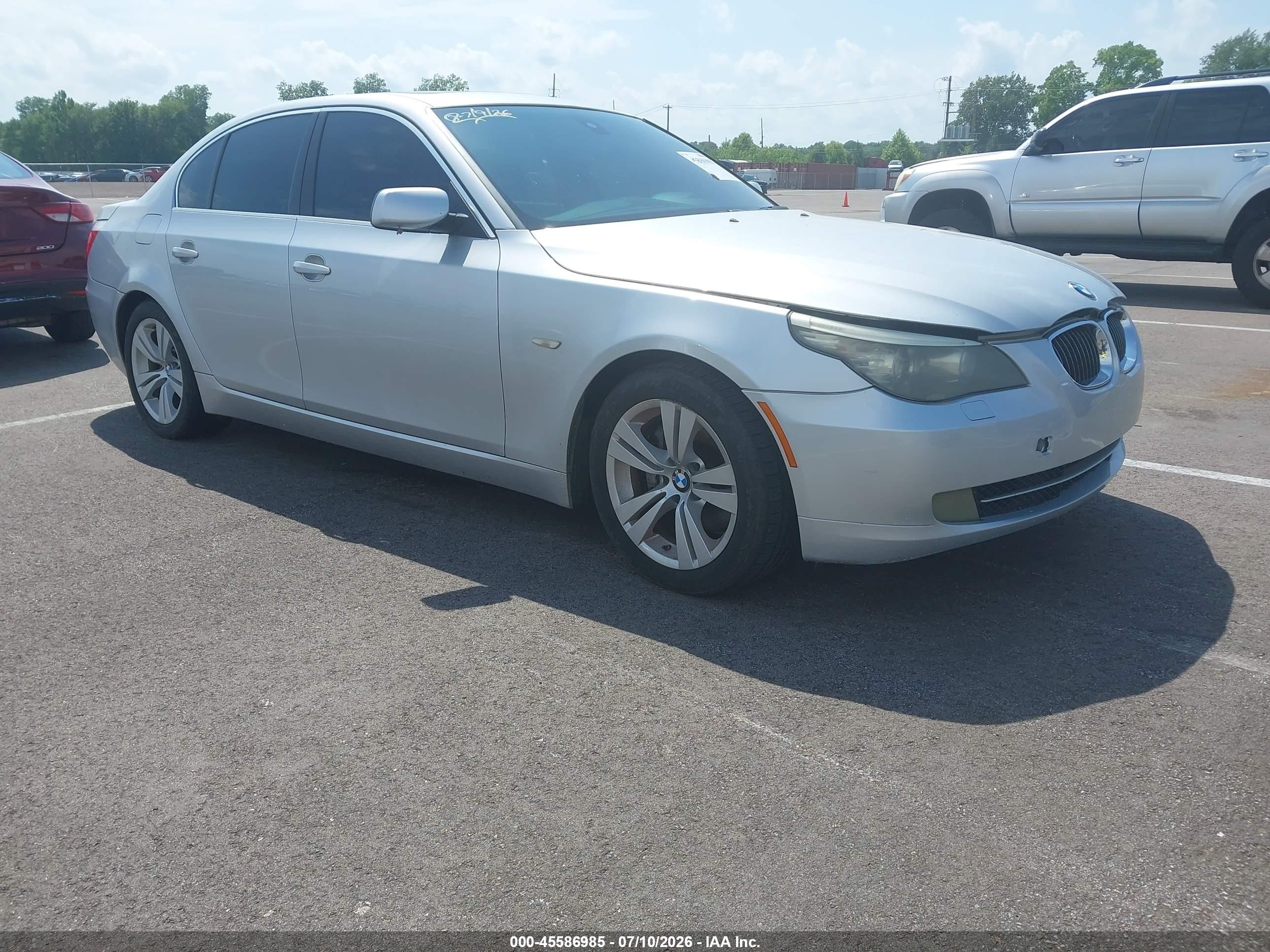2009 BMW 5 Series 528i, VIN WBANU53559C122733 — Normal wear