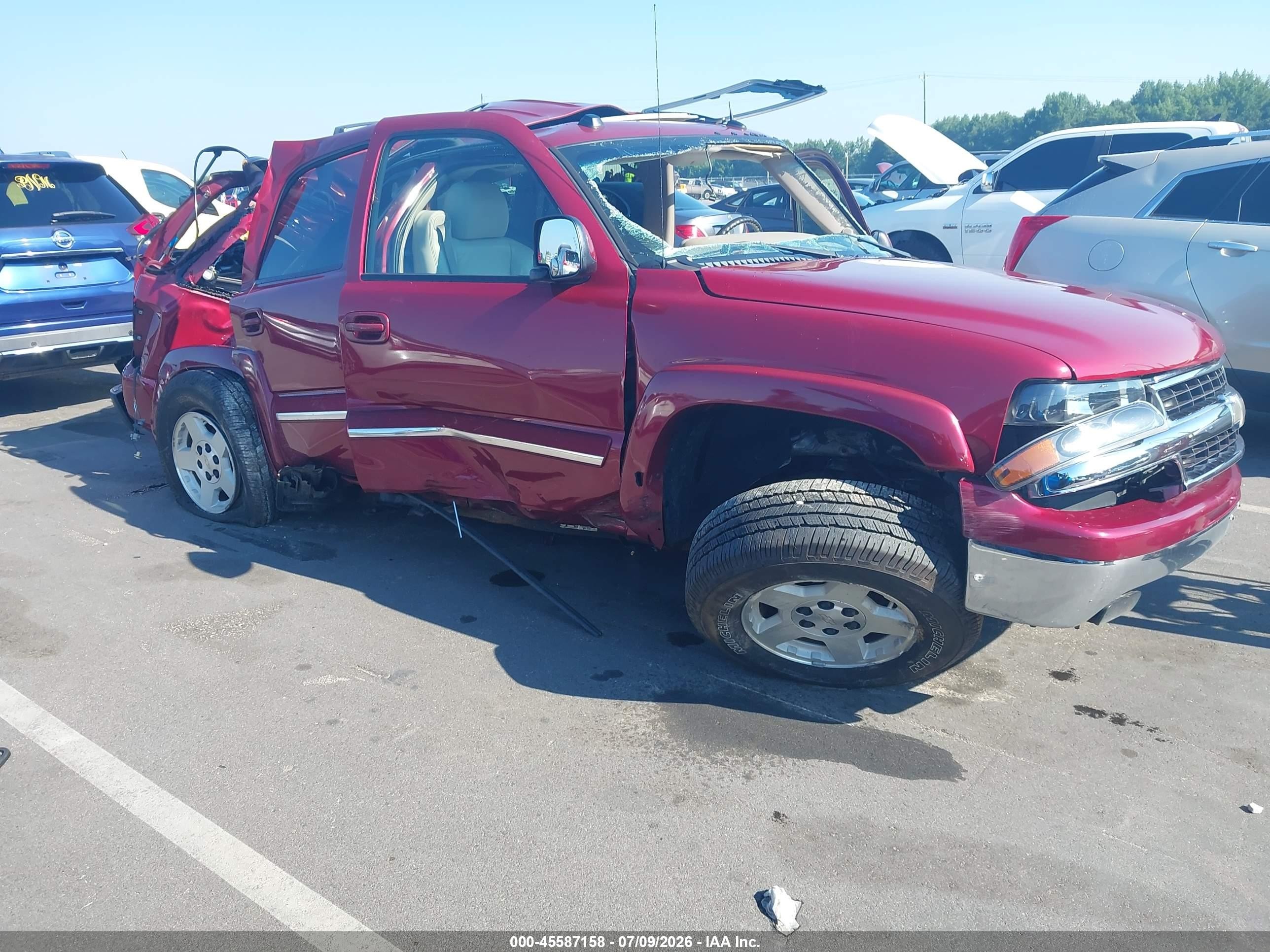 2005 Chevrolet Tahoe LT, VIN 1GNEC13T65R197081 — Rollover