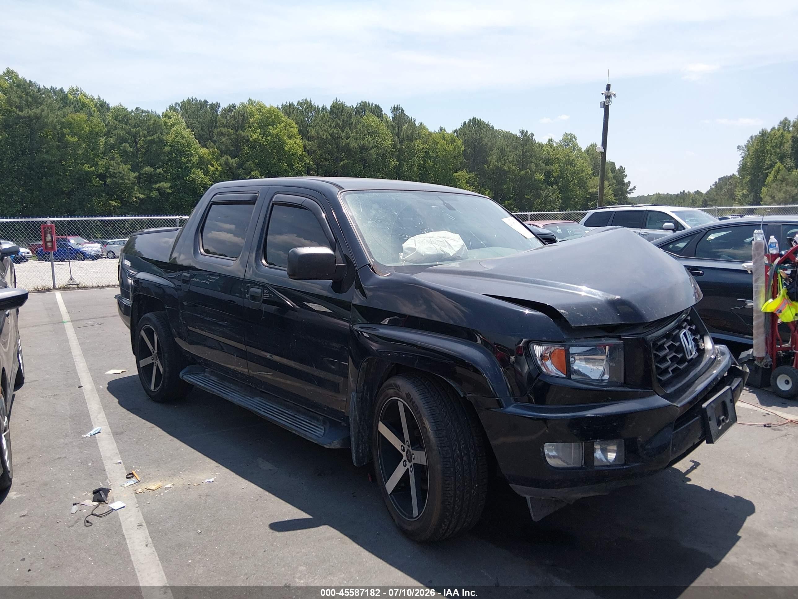 2014 Honda Ridgeline Sport, VIN 5FPYK1F79EB013451 — Front end