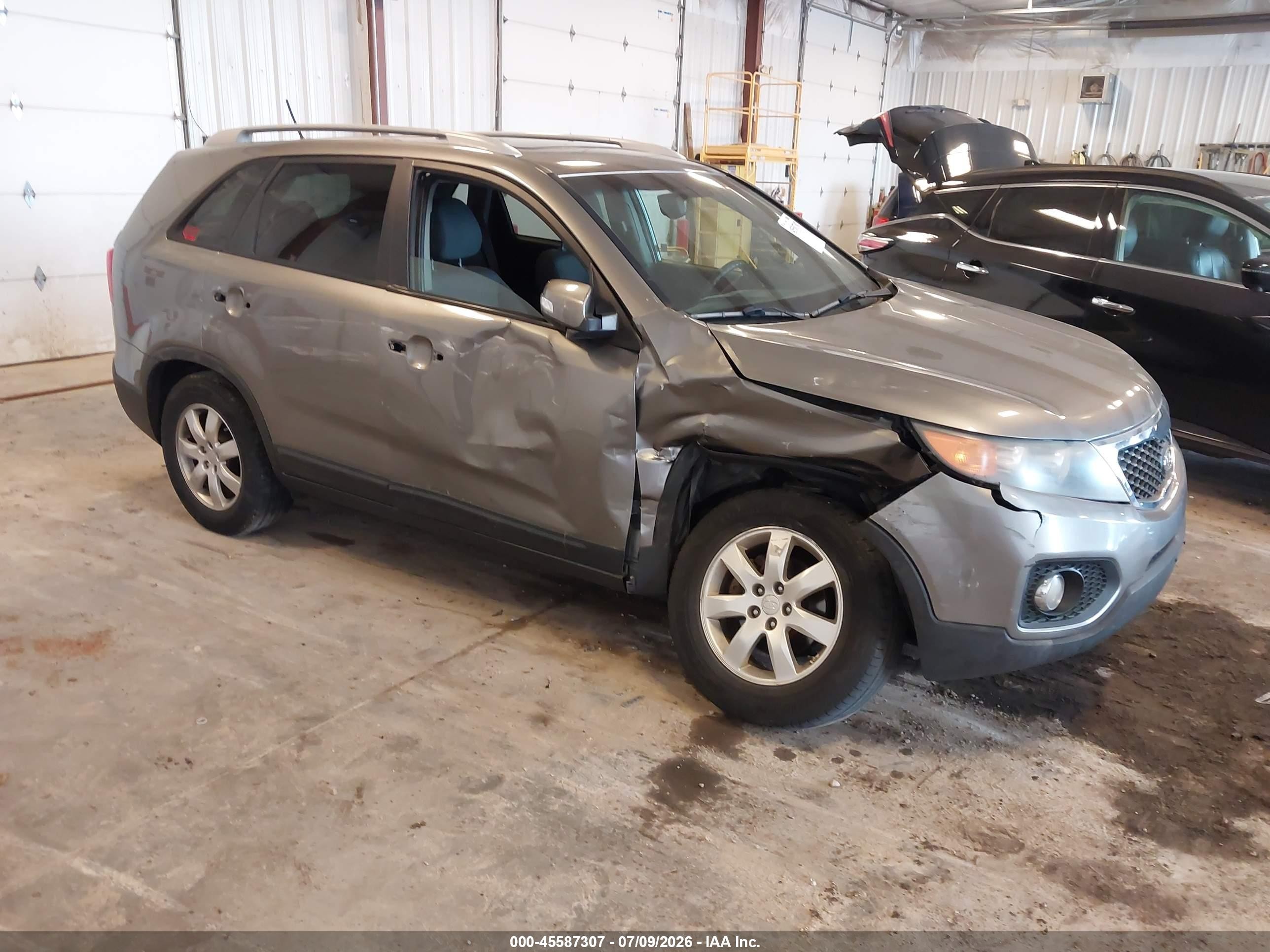 2012 Kia Sorento LX, VIN 5XYKT3A65CG190395 — Side