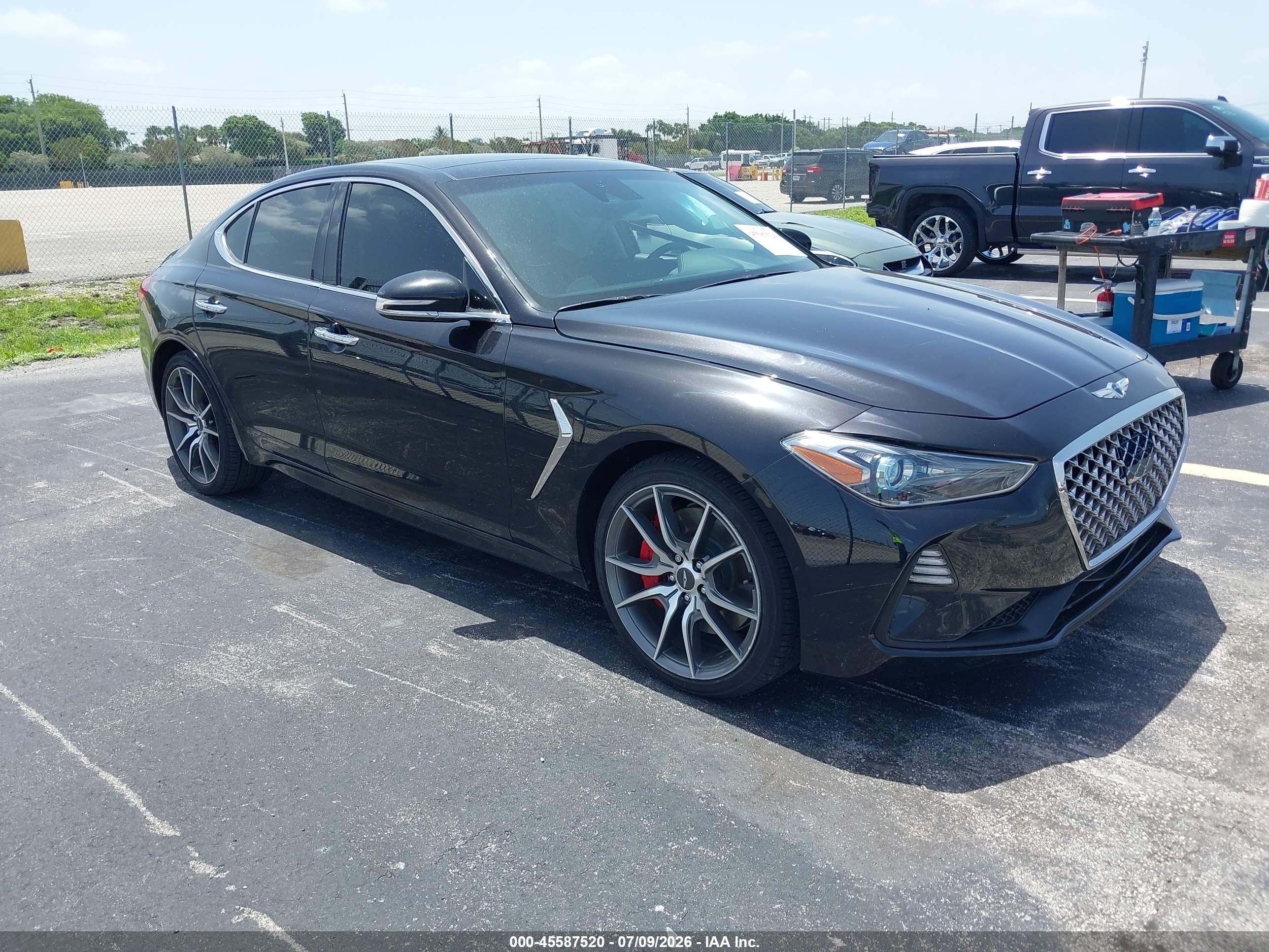 2021 Genesis G70 3.3T, VIN KMTG74LE3MU072691 — Side