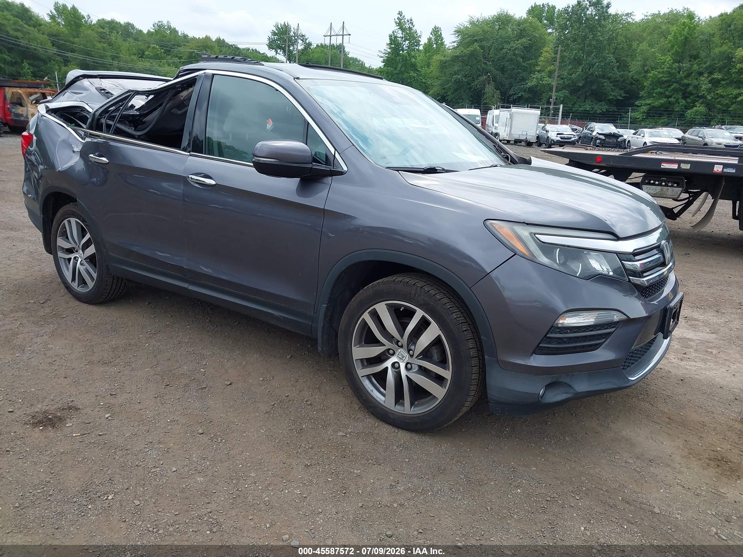 2016 Honda Pilot Elite, VIN 5FNYF6H08GB025233 — Storm