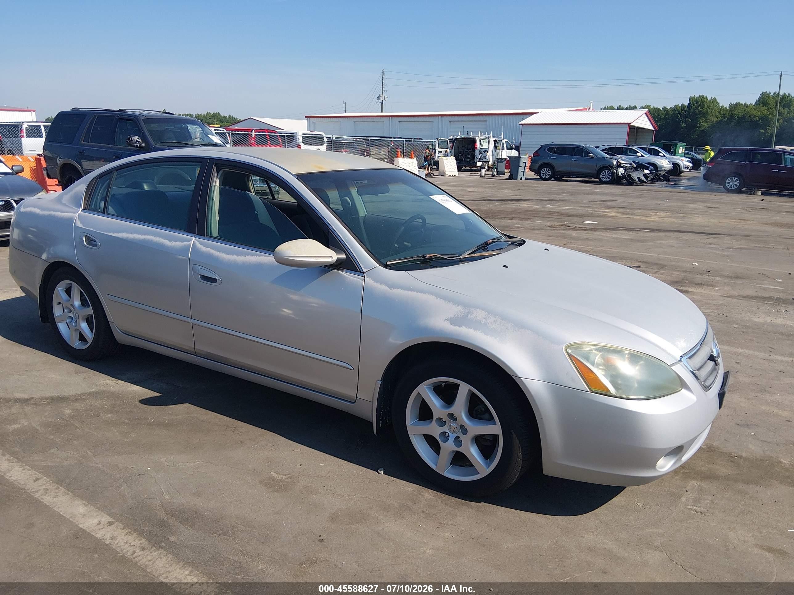 2002 Nissan Altima SE, VIN 1N4BL11D22C126620 — Hail