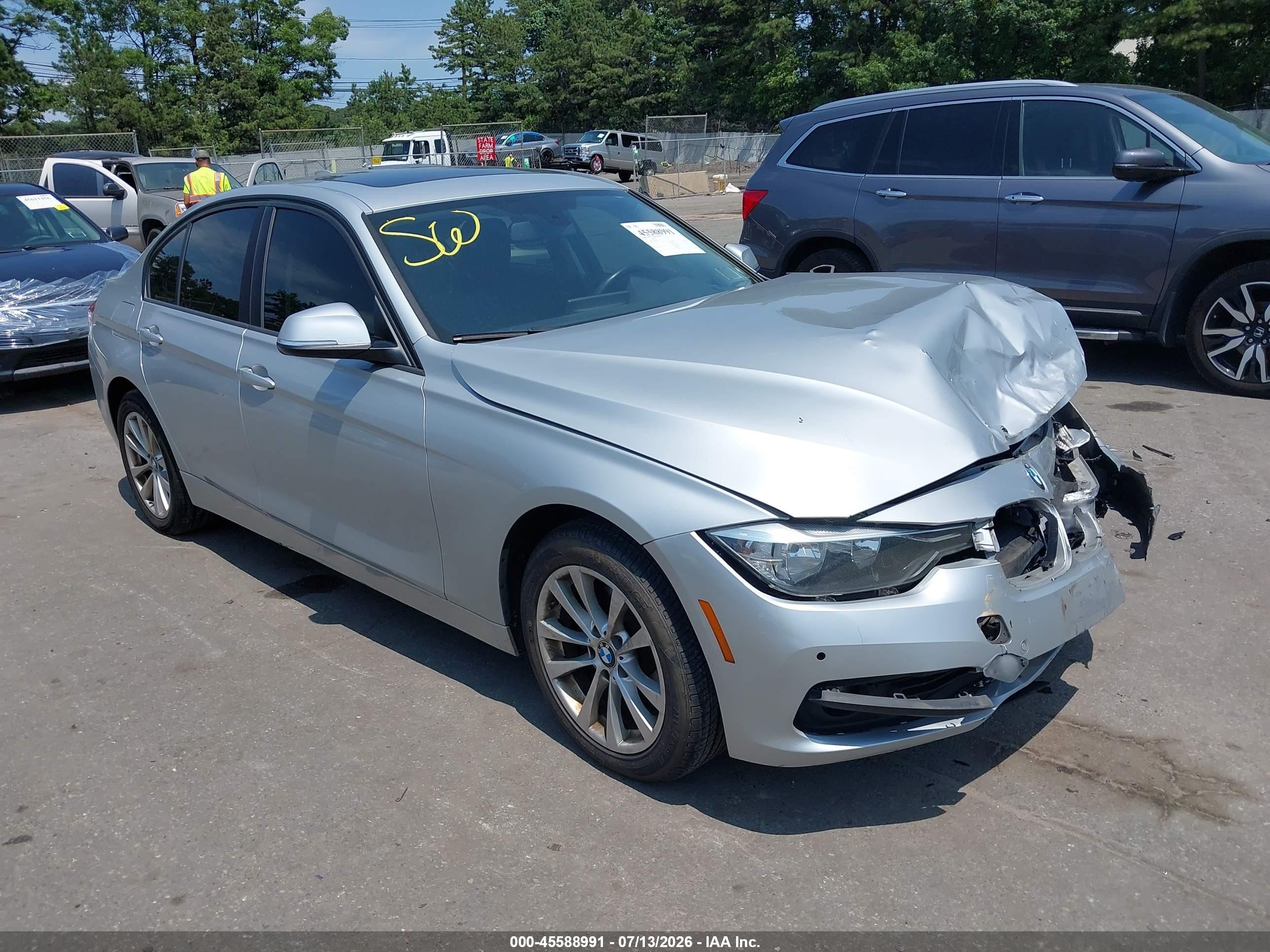 2017 BMW 3 Series 320i xDrive, VIN WBA8E5G55HNU41332 — Front end