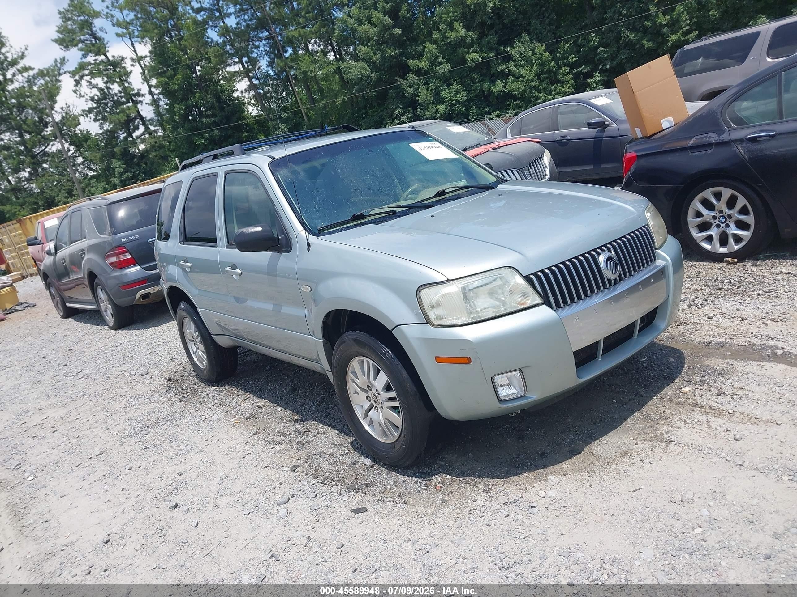 2005 Mercury Mariner Luxury, VIN 4M2YU57185DJ19623 — Normal wear