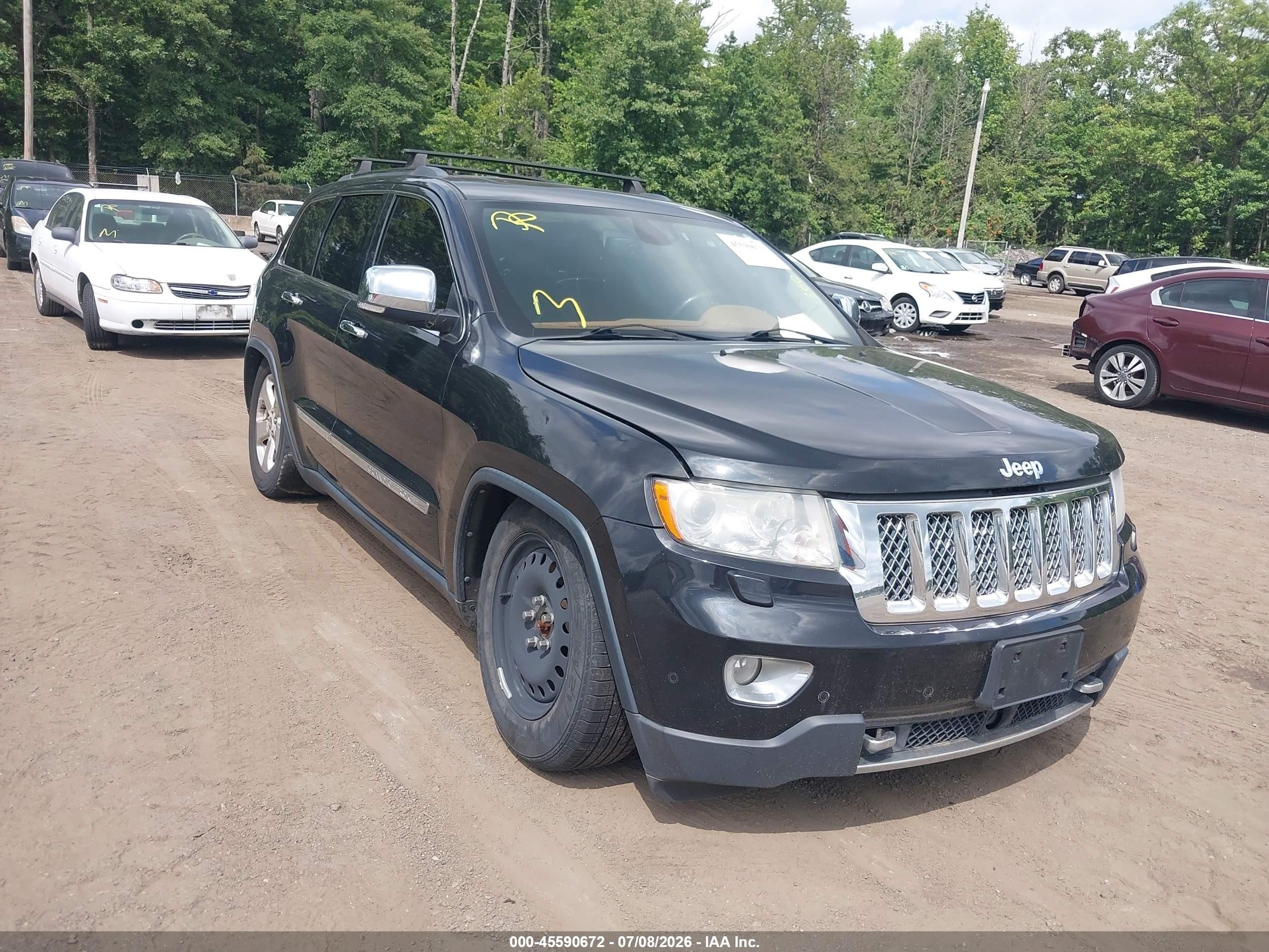 2013 Jeep Grand Cherokee Overland, VIN 1C4RJFCT1DC631373 — Normal wear