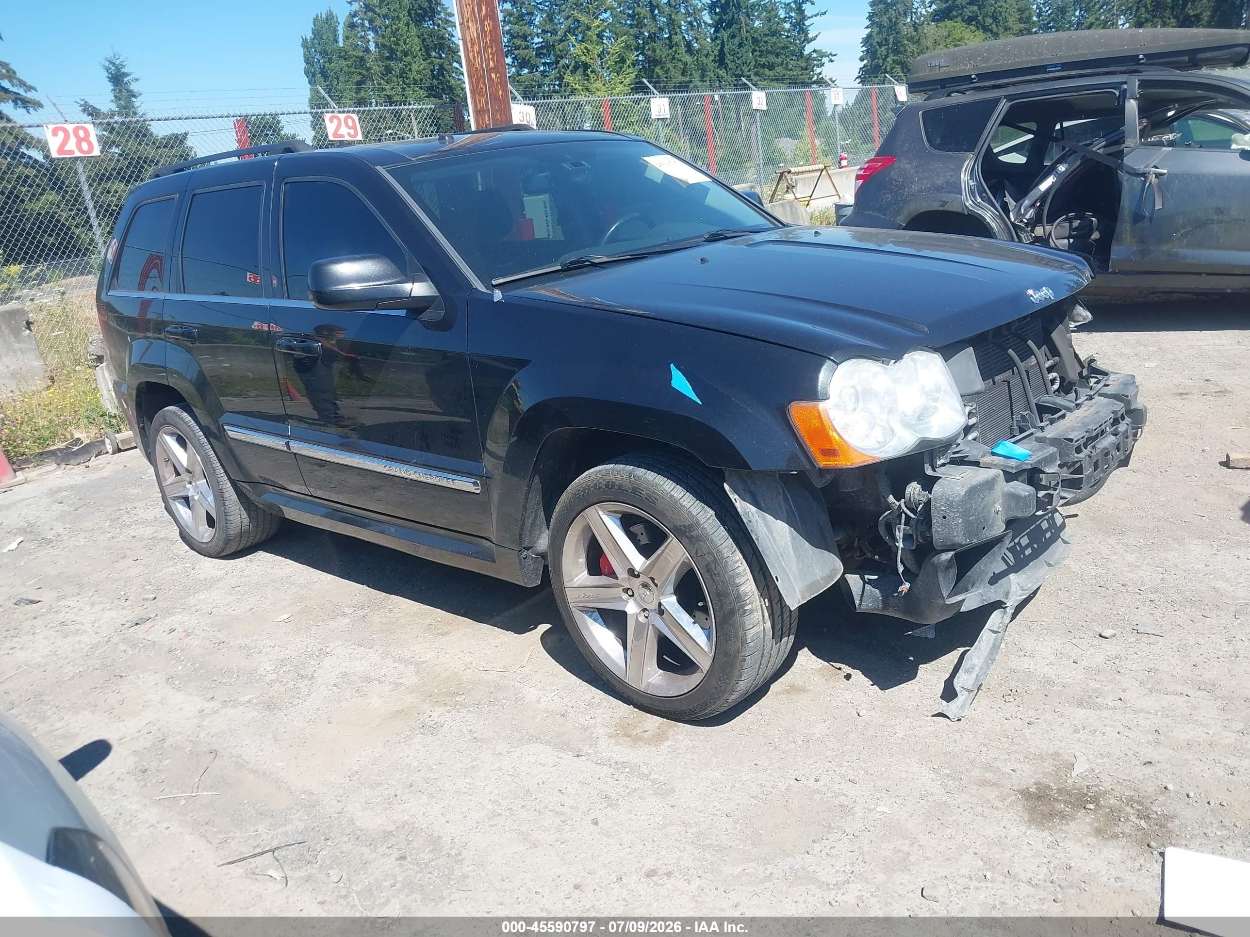 2009 Jeep Grand Cherokee SRT-8, VIN 1J8HR78W99C509454 — Front end
