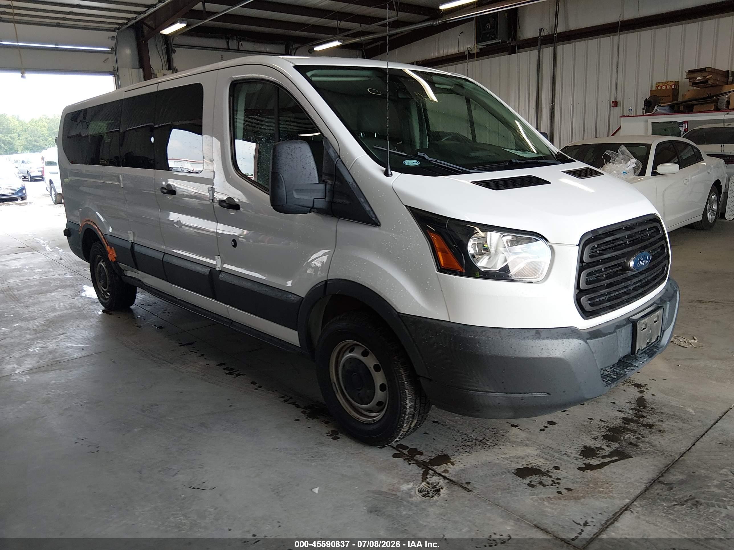 2018 Ford Transit Passenger XL, VIN 1FBZX2ZM7JKB31277 — Side