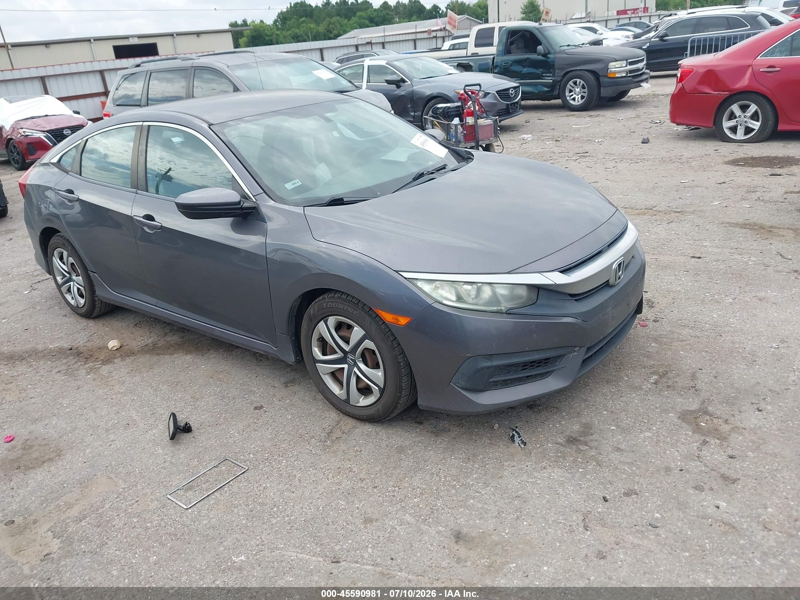 2018 Honda Civic LX, VIN 19XFC2F52JE001806 — Side